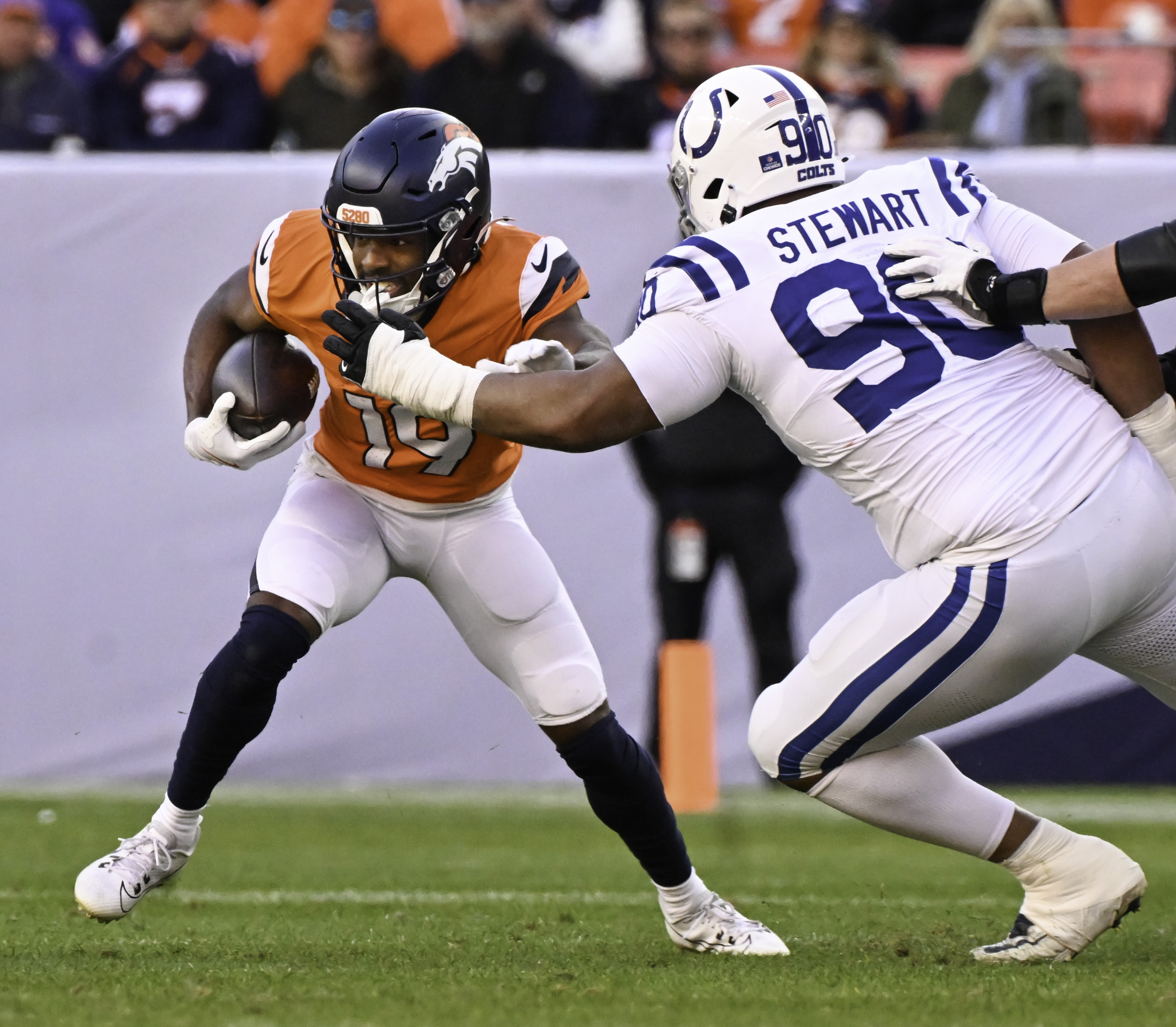 Denver Broncos wide receiver Marvin Mims Jr. (19) runs with the ball during a game against the Colts. The Broncos defeated the Colts 31-13 at Empower Field at Mile High on Sunday, Dec. 15, 2024. (Jerilee Bennett,The Gazette)