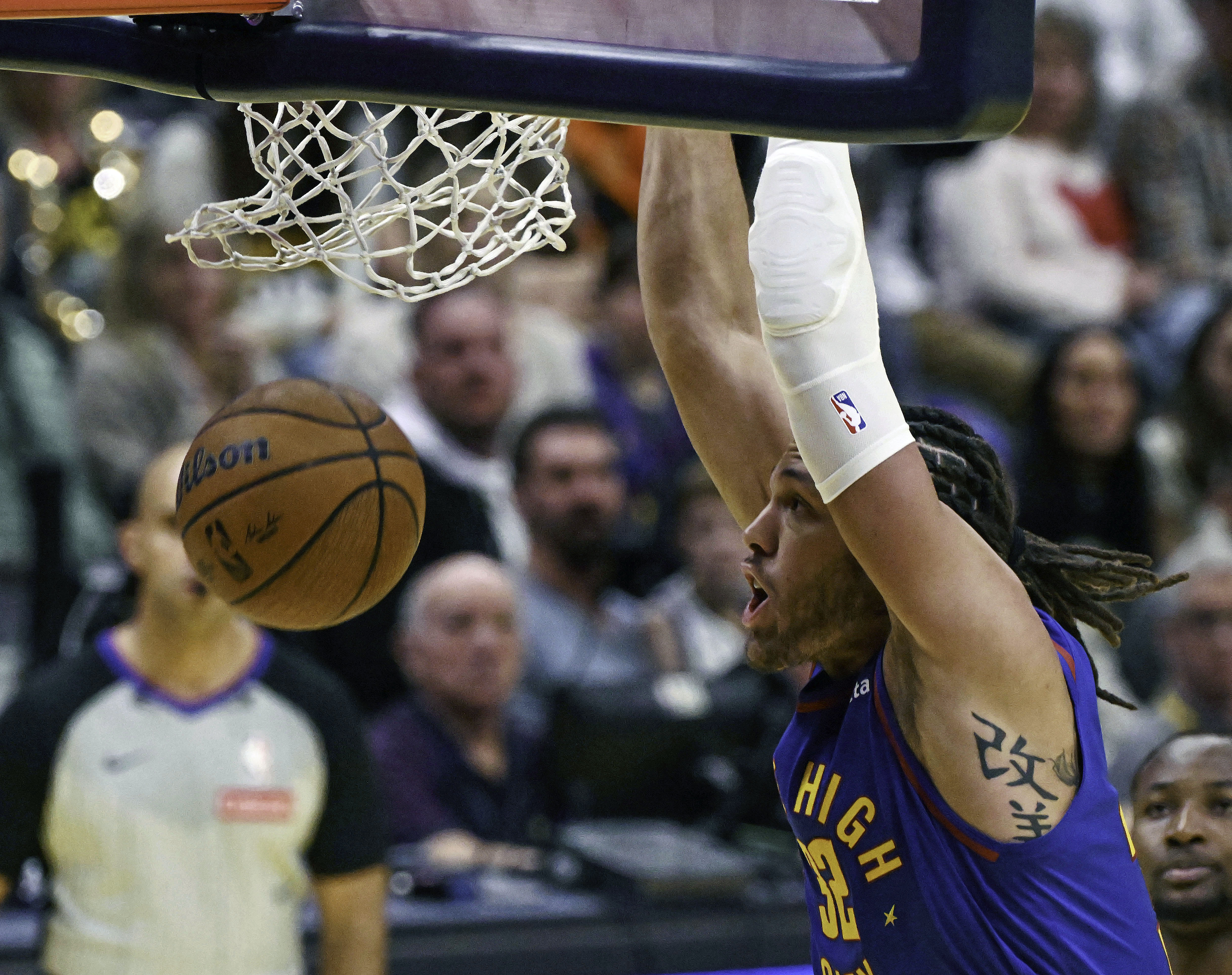 PHOTOS: Nuggets Win Nail Biter Against Warriors, 119-115
