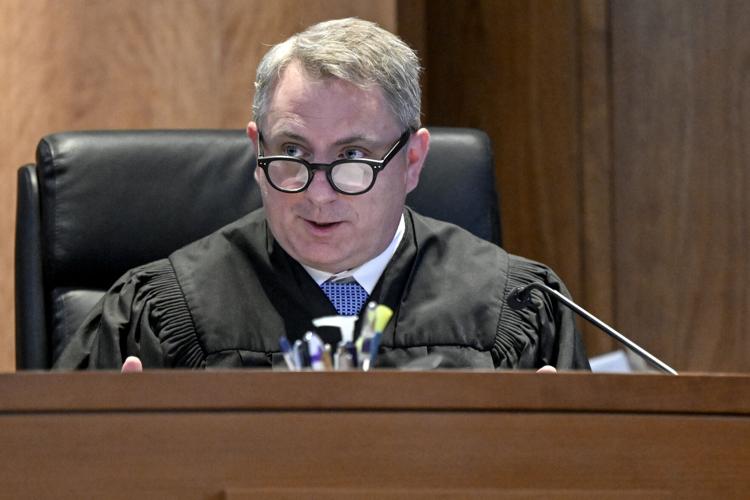 1st Judicial District Court Judge Christopher Zenisek