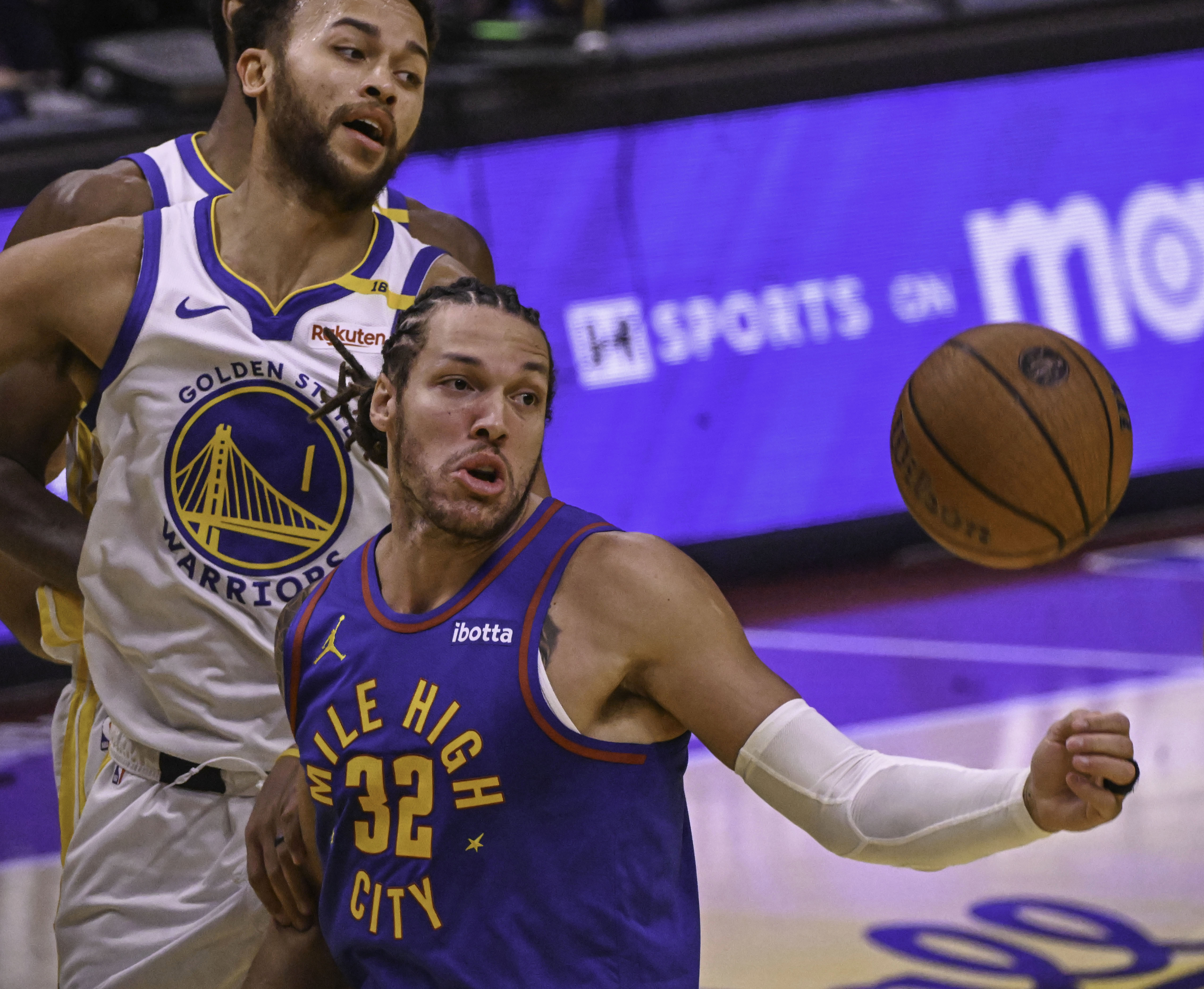 Denver Nuggets forward Aaron Gordon (32) goes after a rebound during an Emirates NBA Cup Group Play game against the Warriors at Ball Arena on Tuesday, Dec. 3, 2024. (Jerilee Bennett, The Gazette)