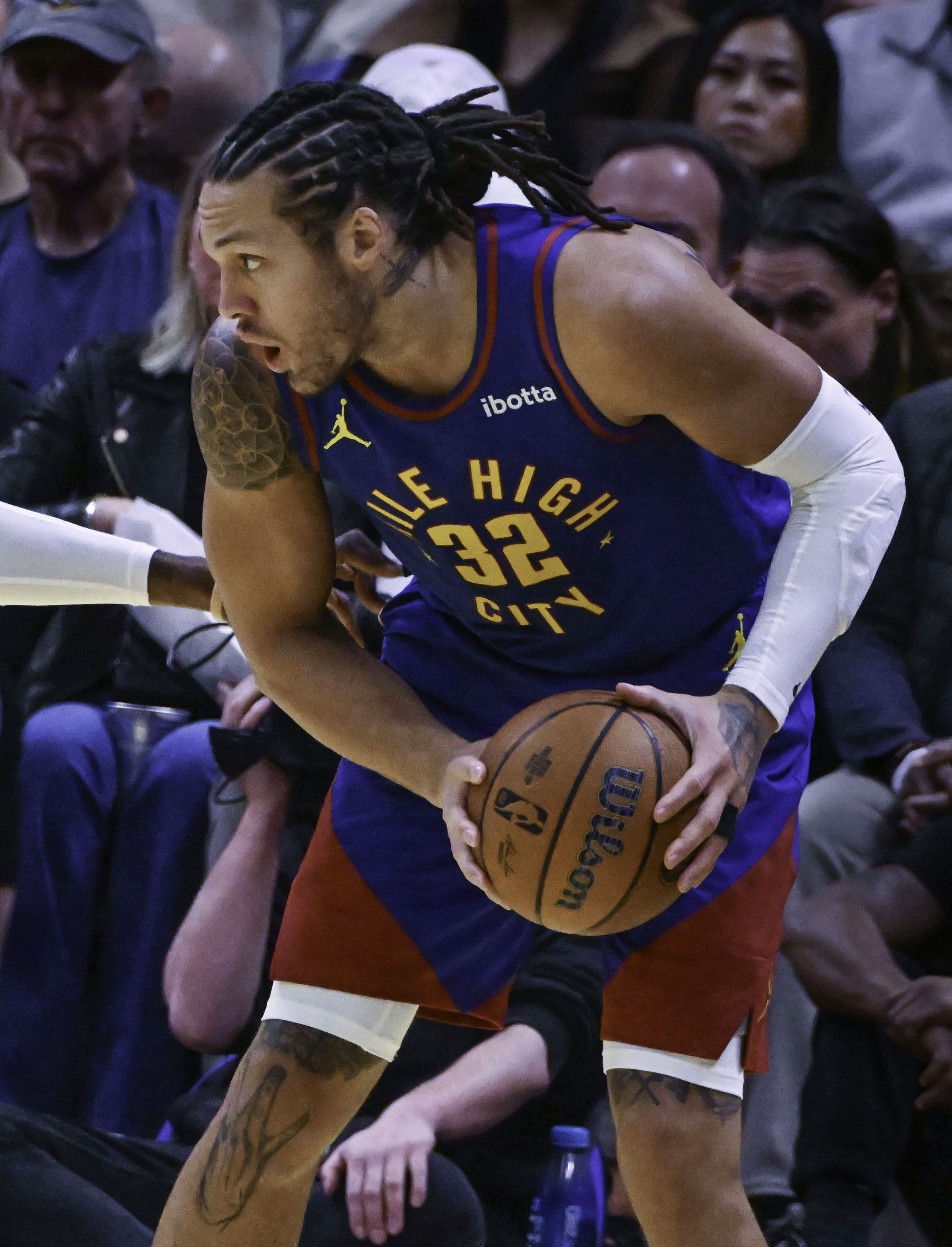 Denver Nuggets forward Aaron Gordon (32) controls the ball during an Emirates NBA Cup Group Play game at Ball Arena on Tuesday, Dec. 3, 2024. The Nuggets defeated the Warriors 119-115. (Jerilee Bennett,The Gazette)
