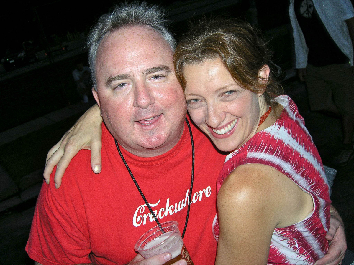 Lee Anderson, left, and longtime friend Mare Trevathan enjoy a moment at the 2012 Undergound Music Showcase in the Baker neighborhood. Twelve years later, Trevathan would donate a kidney to Anderson as a living donor. (JOHN MOORE/DENVER GAZETTE)