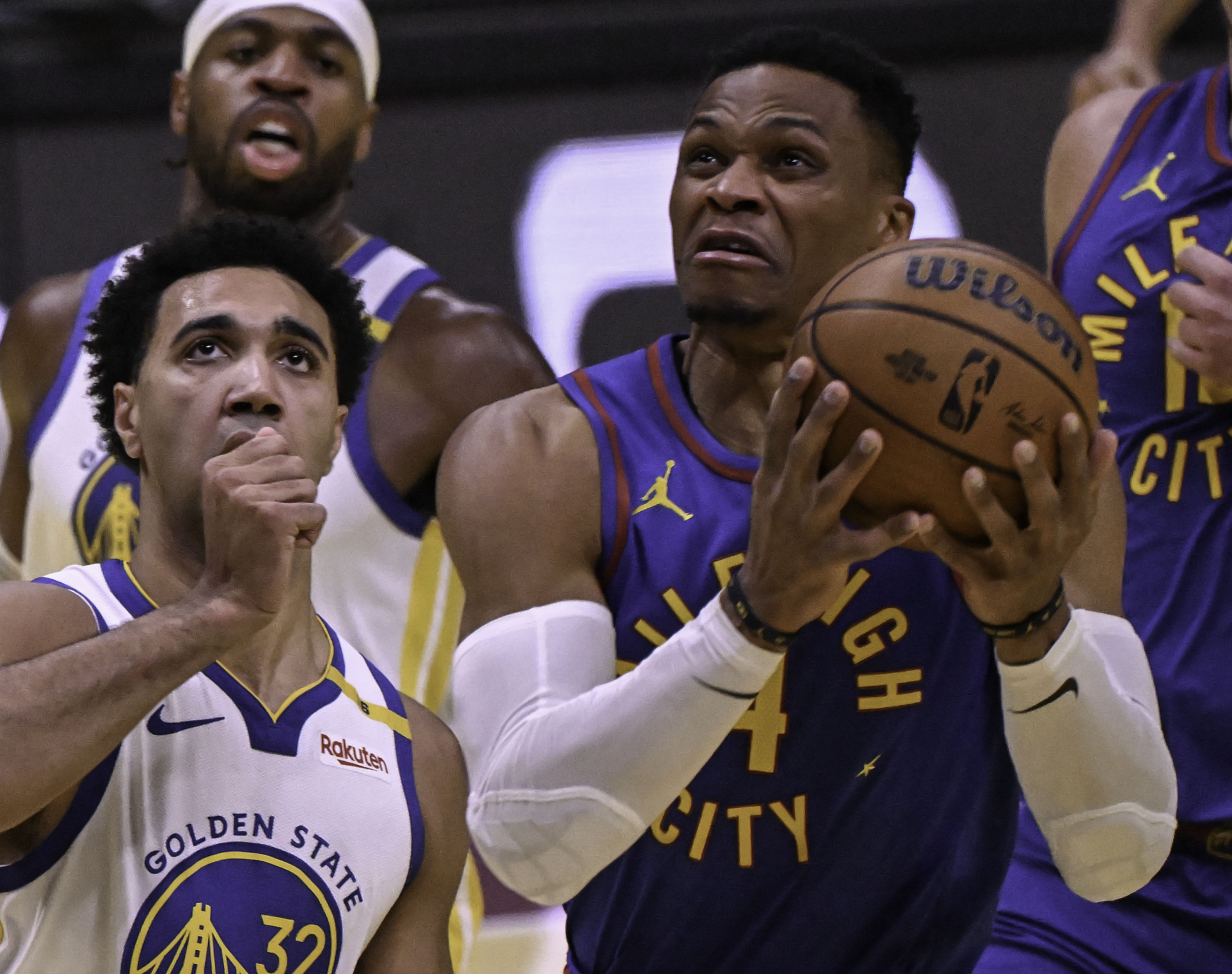 Denver Nuggets guard Russell Westbrook (4) goes up for a shot over Golden State Warriors forward Trayce Jackson-Davis (32) during the third quarter of an Emirates NBA Cup Group Play game at Ball Arena on Tuesday, Dec. 3, 2024. (Jerilee Bennett,The Gazette)