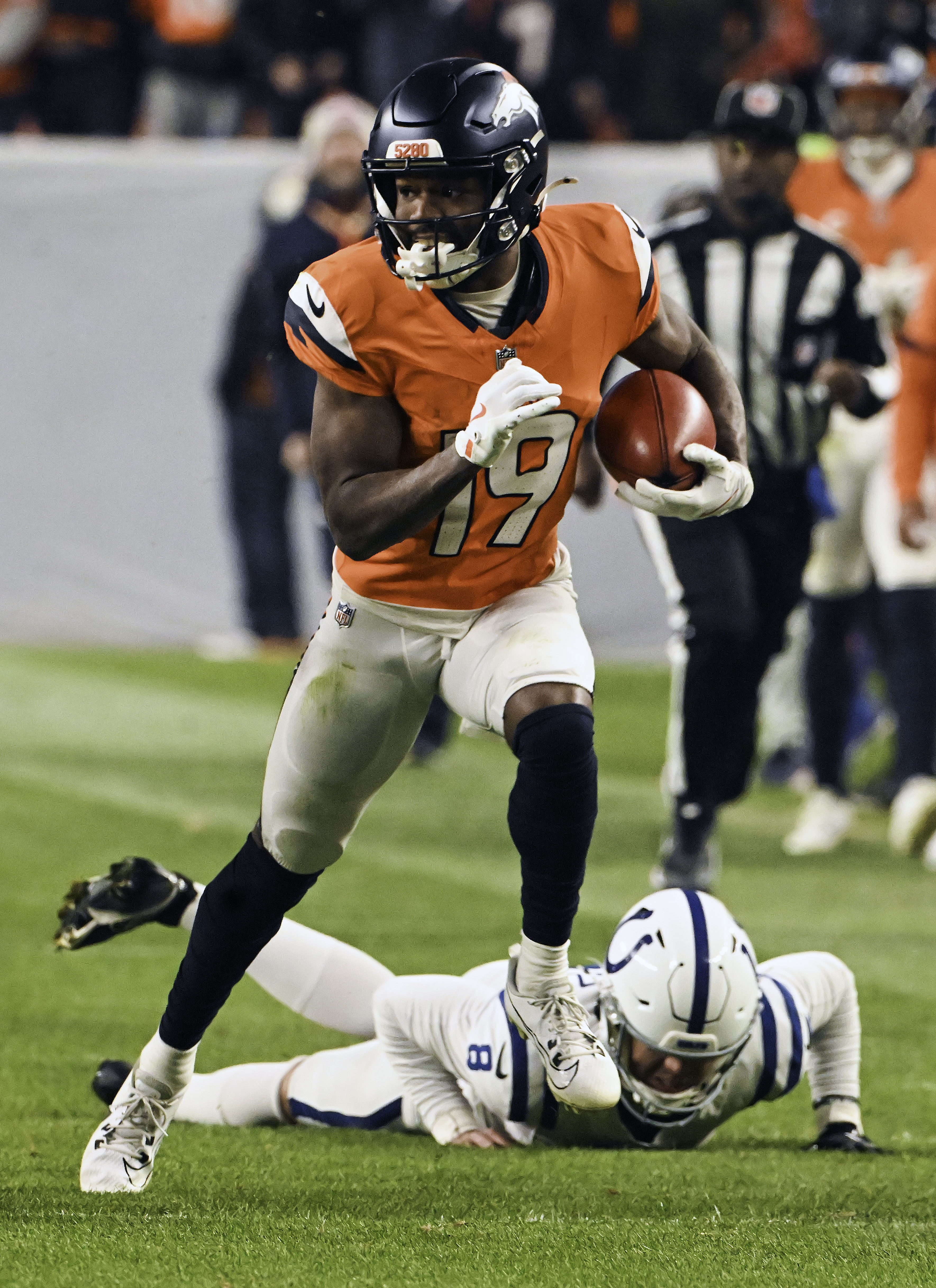 Denver Broncos wide receiver Marvin Mims Jr. (19) runs downfield after a punt during a game against the Colts on Sunday, Dec. 15, 2024. (Jerilee Bennett,The Gazette)