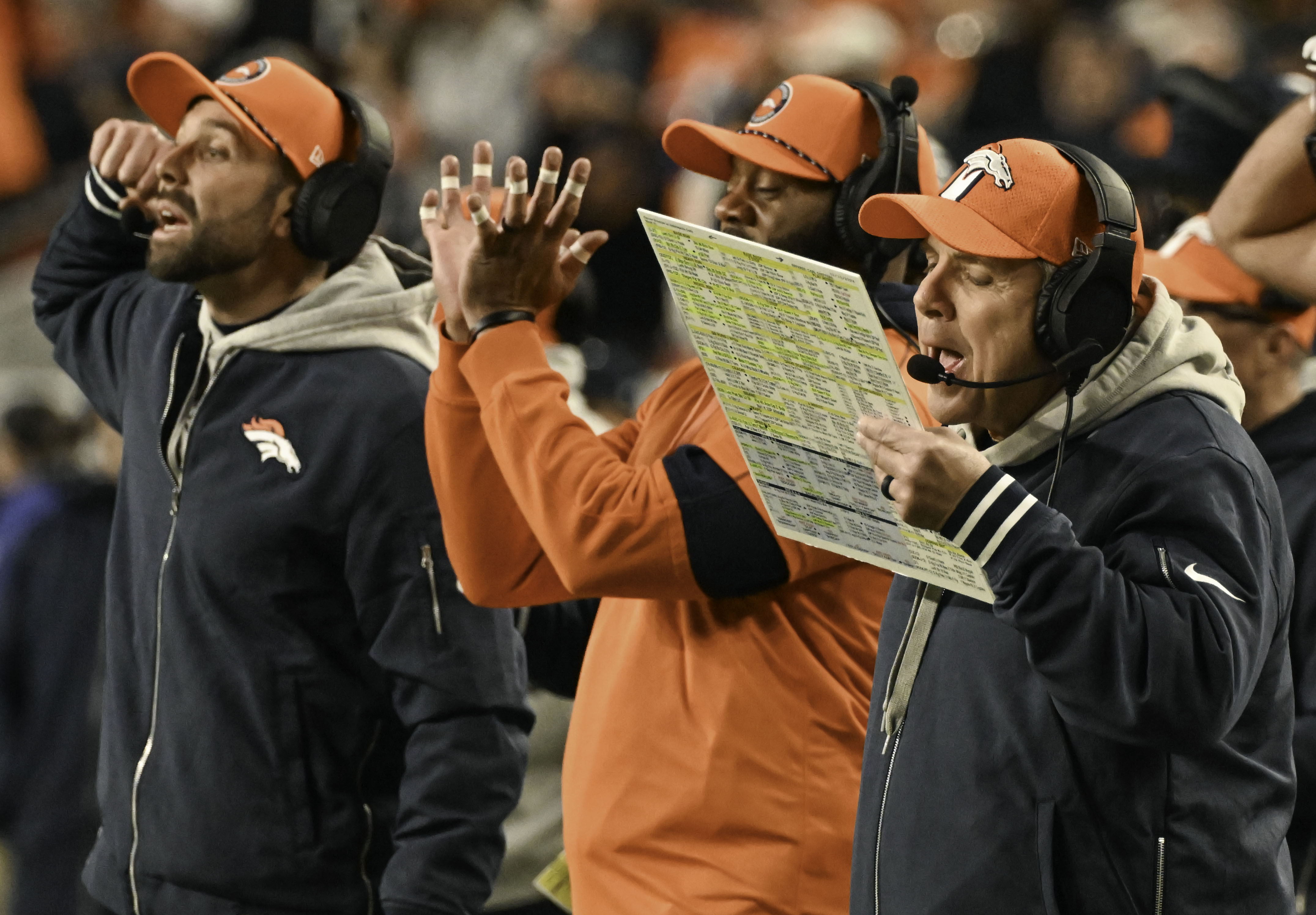 Broncos Head Coach Sean Payton, wide receiver coach Keary Colbert, and quarterbacks coach Davis Webb work on plays during a game against the Colts on Sunday, Dec. 15, 2024. (Jerilee Bennett,The Gazette)