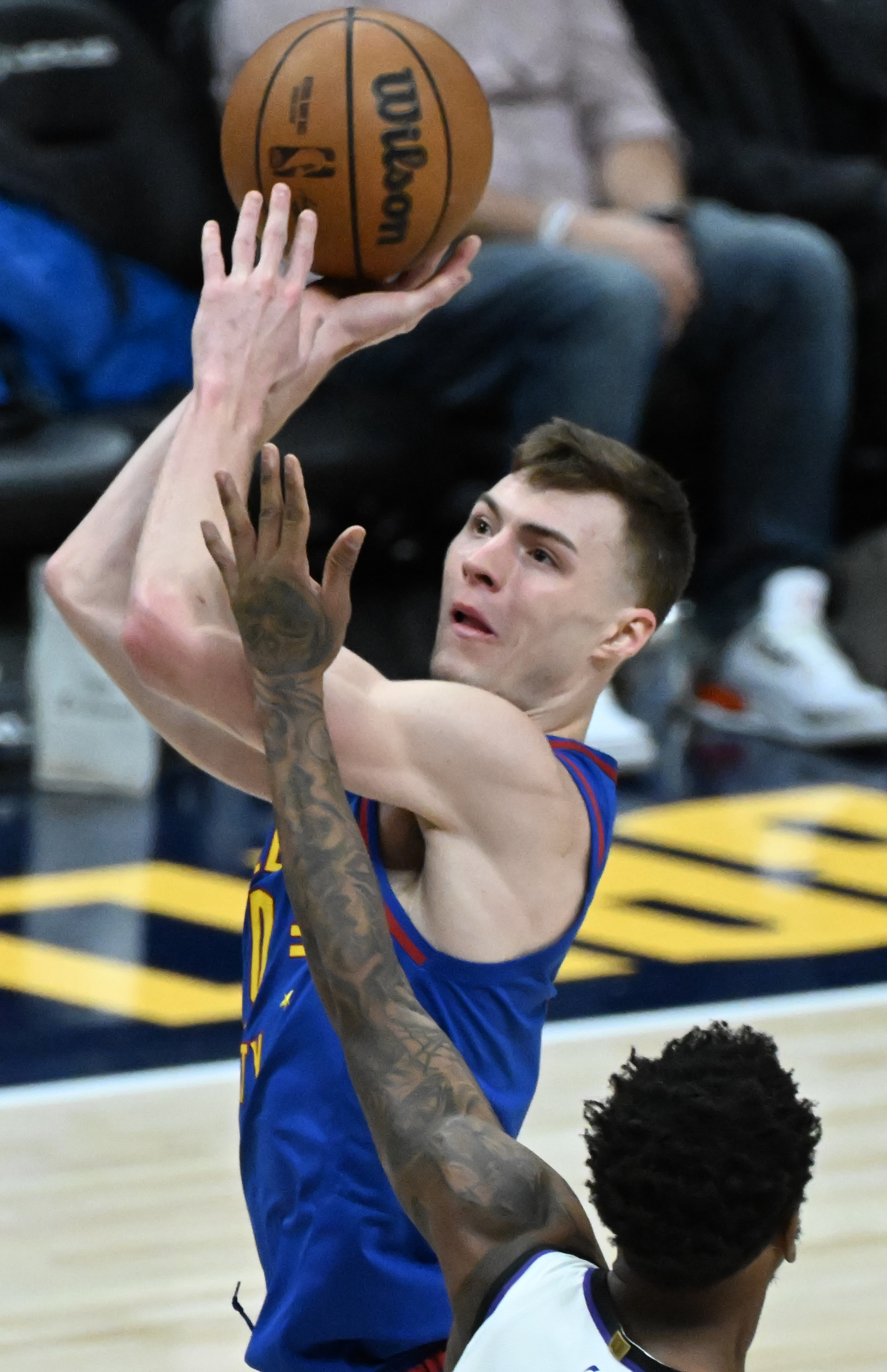 Denver Nuggets guard Christian Braun (0) goes up for a shot over the Sacramento Kings during game at Ball Arena on Thursday, Jan. 23, 2025. The Nuggets defeated the Kings 132-123. (Jerilee Bennett,The Gazette)