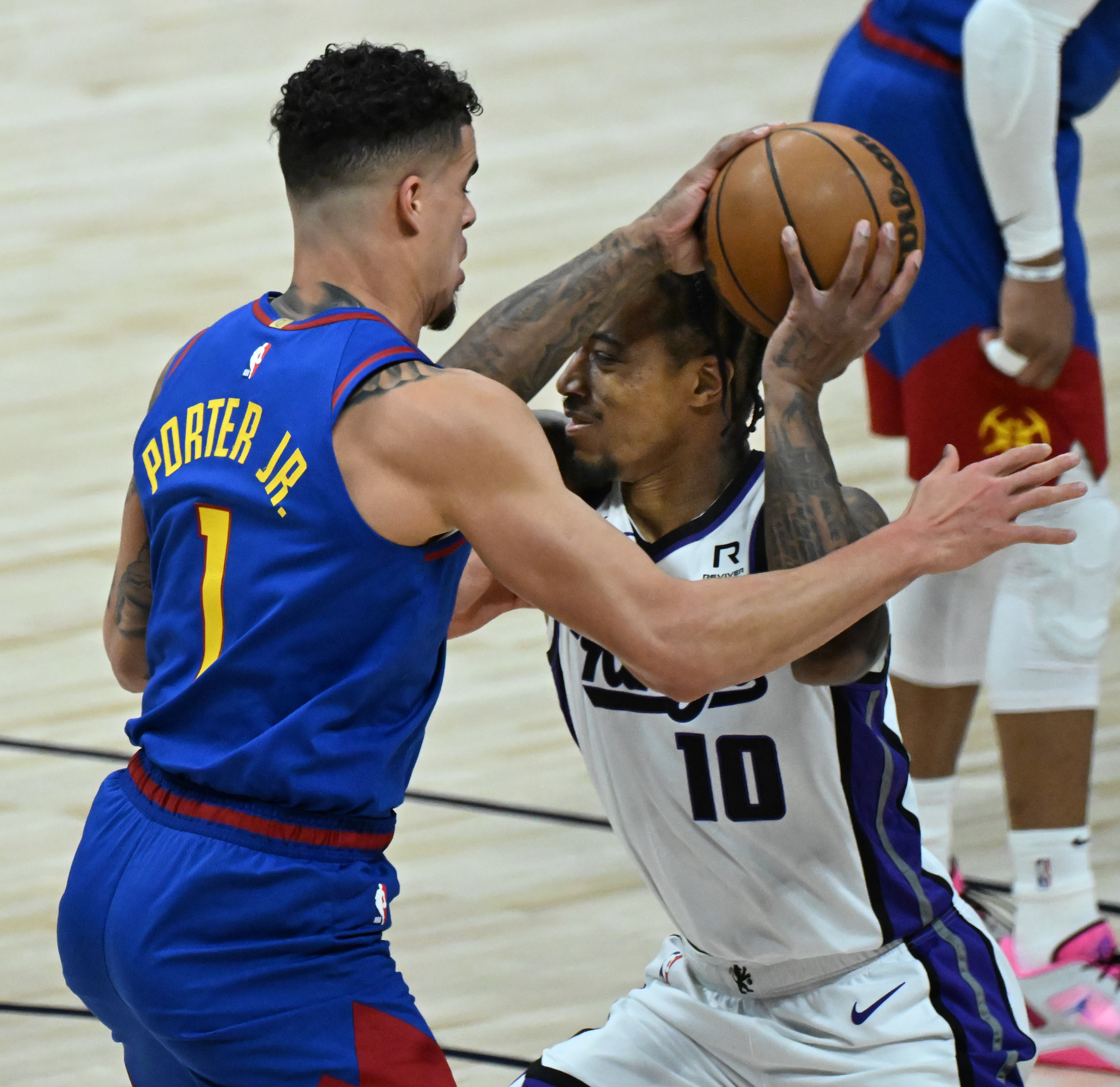Denver Nuggets forward Michael Porter Jr. (1) defends Sacramento Kings forward DeMar DeRozan (10) during game at Ball Arena on Thursday, Jan. 23, 2025. The Nuggets defeated the Kings 132-123. (Jerilee Bennett,The Gazette)