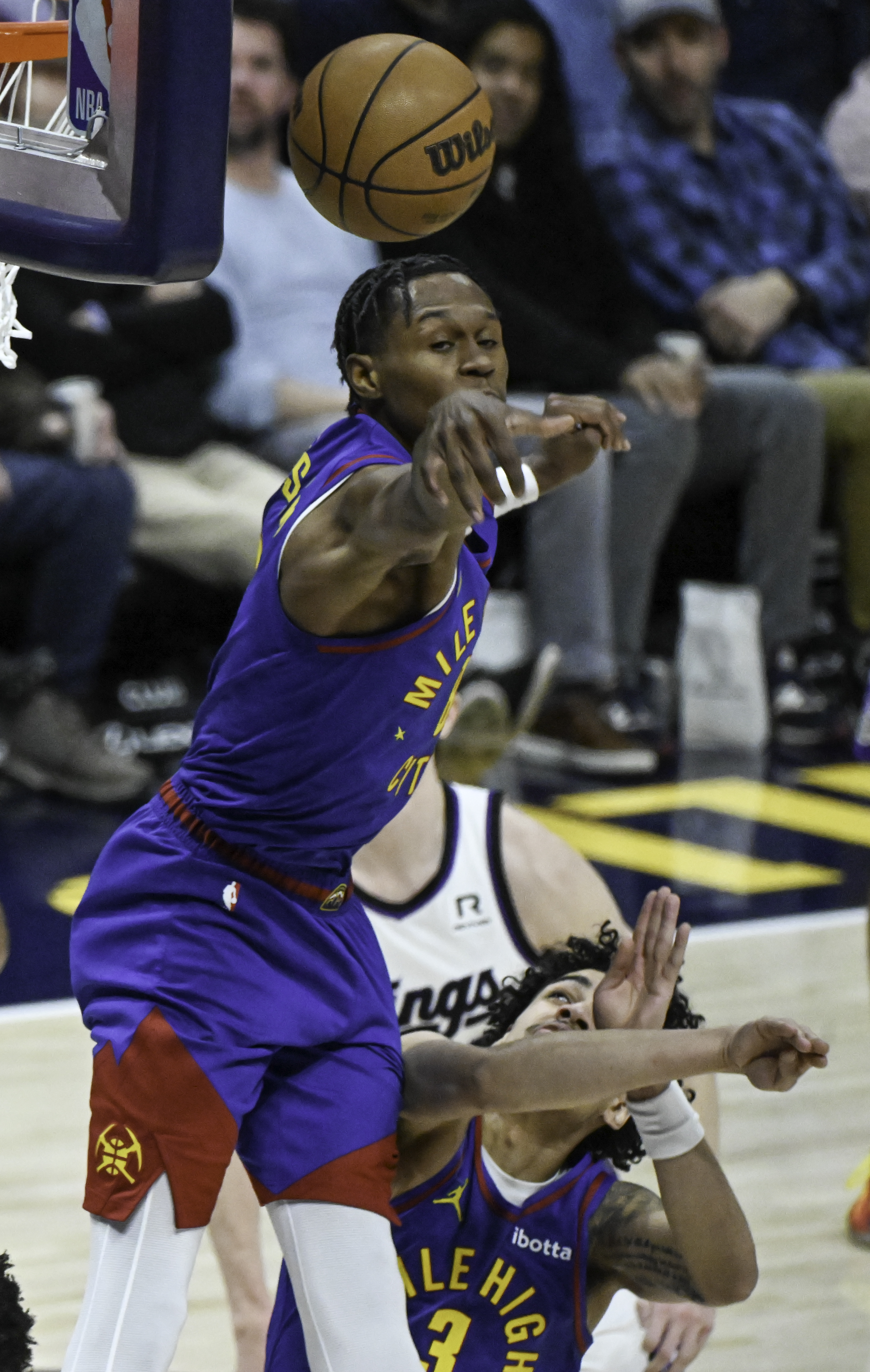 Denver Nuggets forward Peyton Watson (8) blocks a shot during the second quarter of a game at Ball Arena on Thursday, Jan. 23, 2025. (Jerilee Bennett,The Gazette)