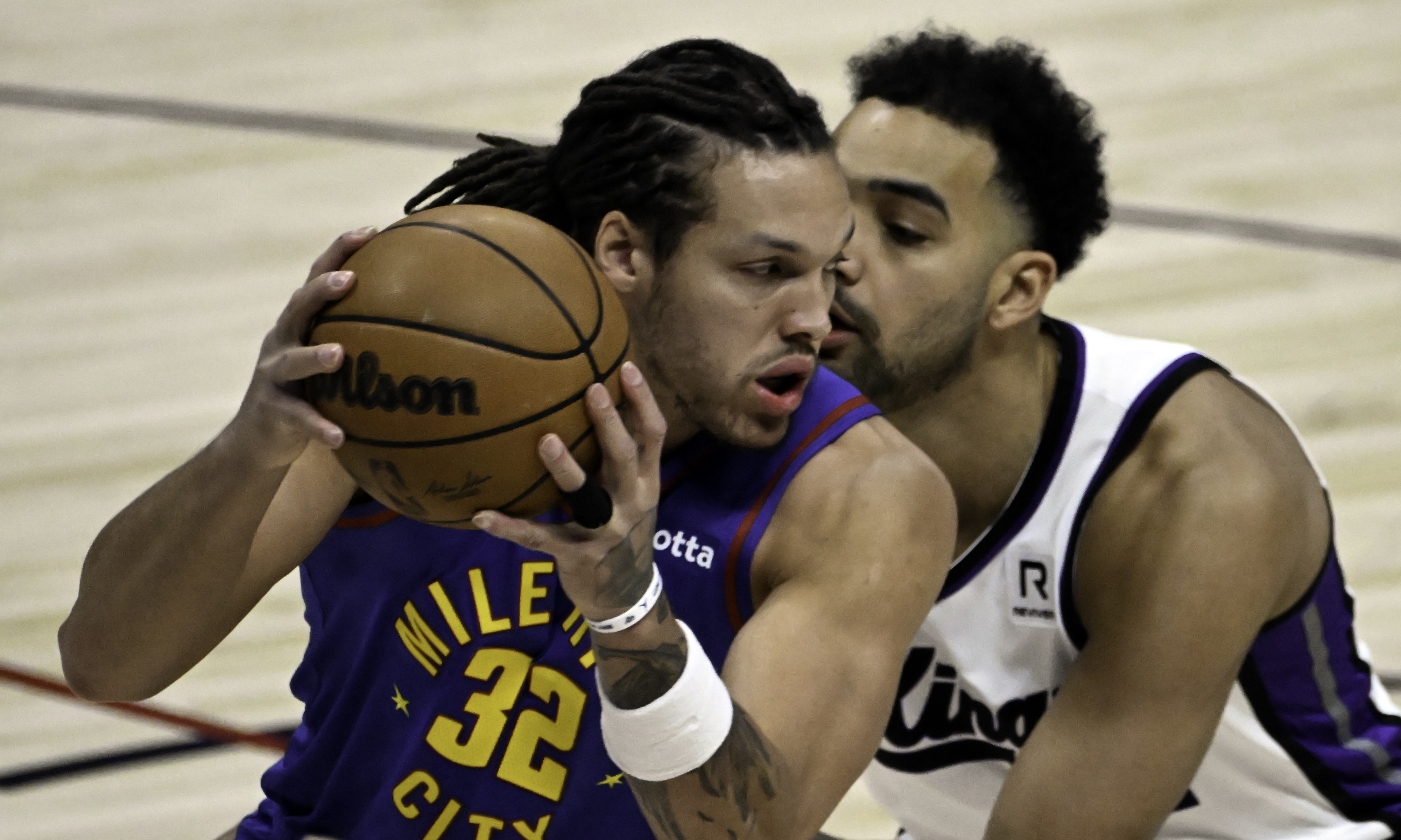 Denver Nuggets forward Aaron Gordon (32) is defended by Sacramento King’s Tres Lyles during the first quarter of a game at Ball Arena on Thursday, Jan. 23, 2025. (Jerilee Bennett,The Gazette)