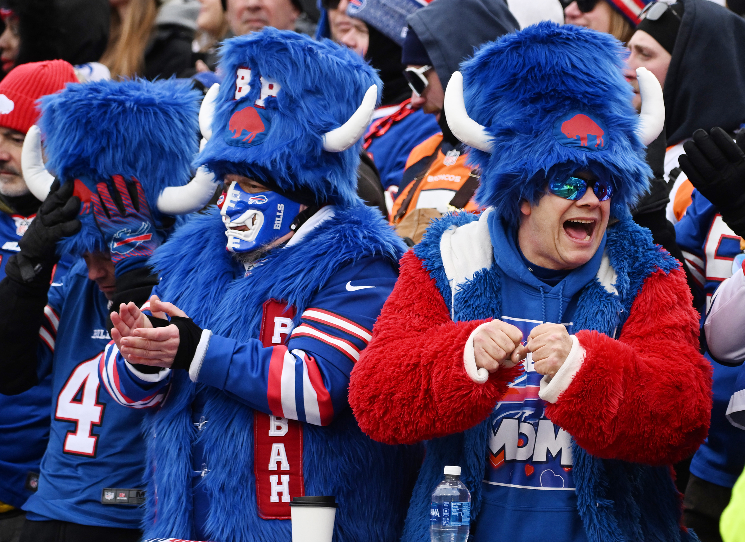 Buffalo fans celebrate a touchdown by Buffalo Bills running back James Cook (4) during the wild card playoff game against the Bills in Buffalo on Sunday, January 12, 2024. The Broncos lost the game 31-7. (Jerilee Bennett, The Gazette)