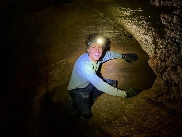 Spencer McKee enters one of the larger tunnels featured on the Cave of the Winds. Photo Credit: Alyssa Mulzer.