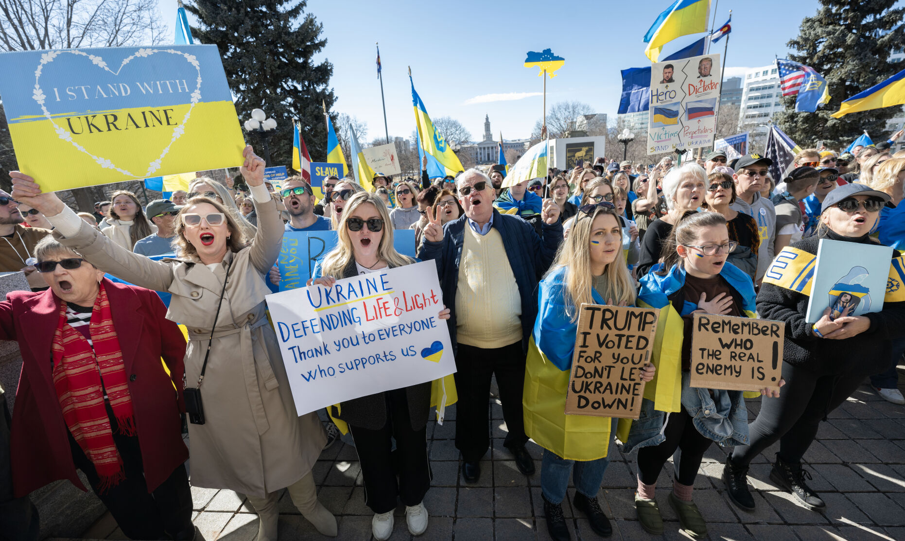 People cheer at the steps of the Colorado State Capitol Sunday, Feb. 23, 2025, in Denver during a Stand for Ukraine Rally on the eve of the third anniversary of Russia's attack on Ukraine. About 1,000 people showed up at the rally organized by Ukrainians of Colorado. (The Gazette, Christian Murdock) (Christian Murdock, The Gazette)