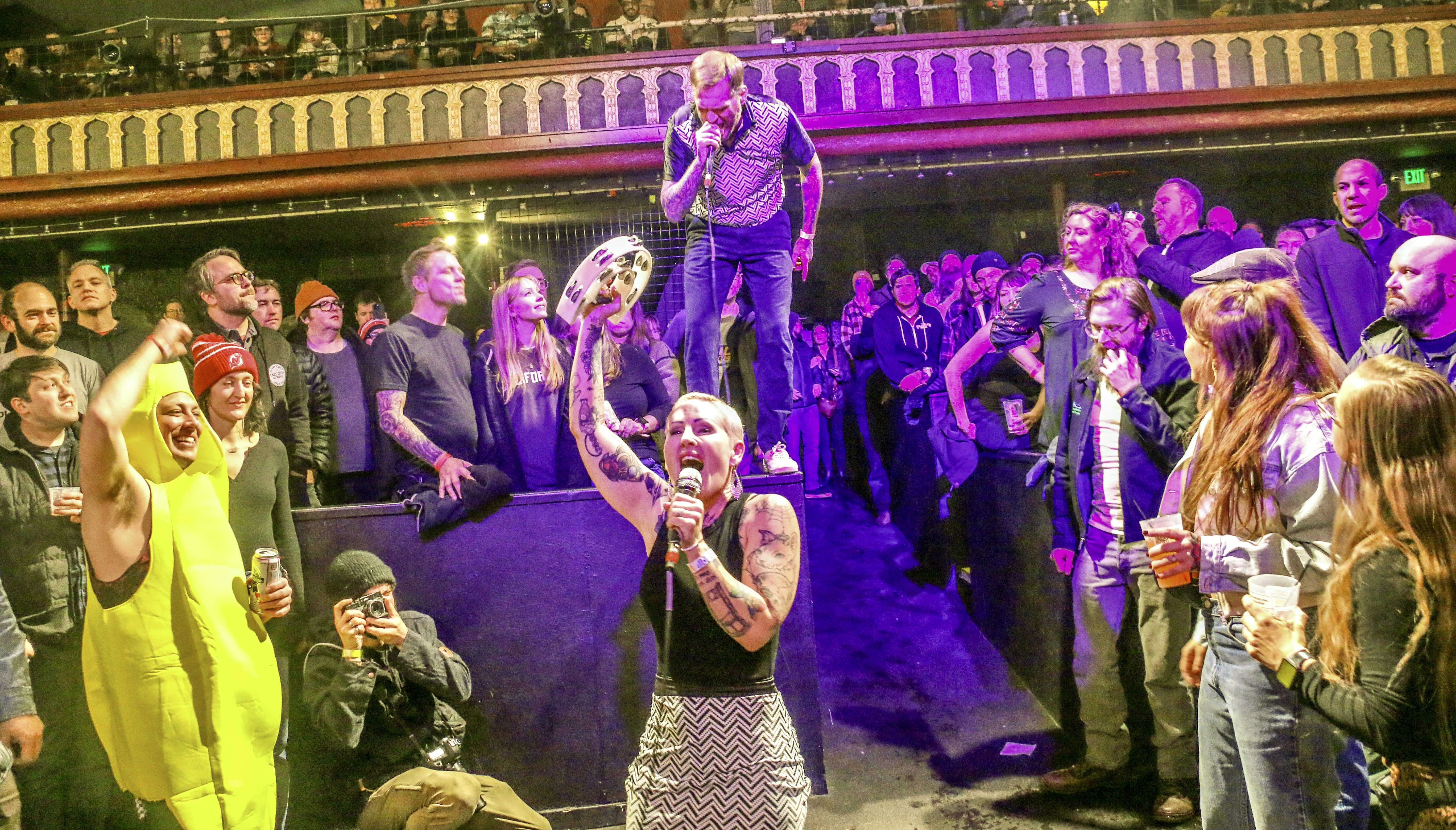 9. Dawn Nock and Ben Roy of the punk band Spells work the crowd while opening for Ted Leo and the Pharmacists on Jan. 25, 2025, at the Oriental Theater in northwest Denver. Twenty minutes after the set, Roy was doing a stand-up comedy routine 2 miles east at the Bug Theater, riffing in part on what had just happened at the Oriental. (JOHN MOORE/THE DENVER GAZETTE)