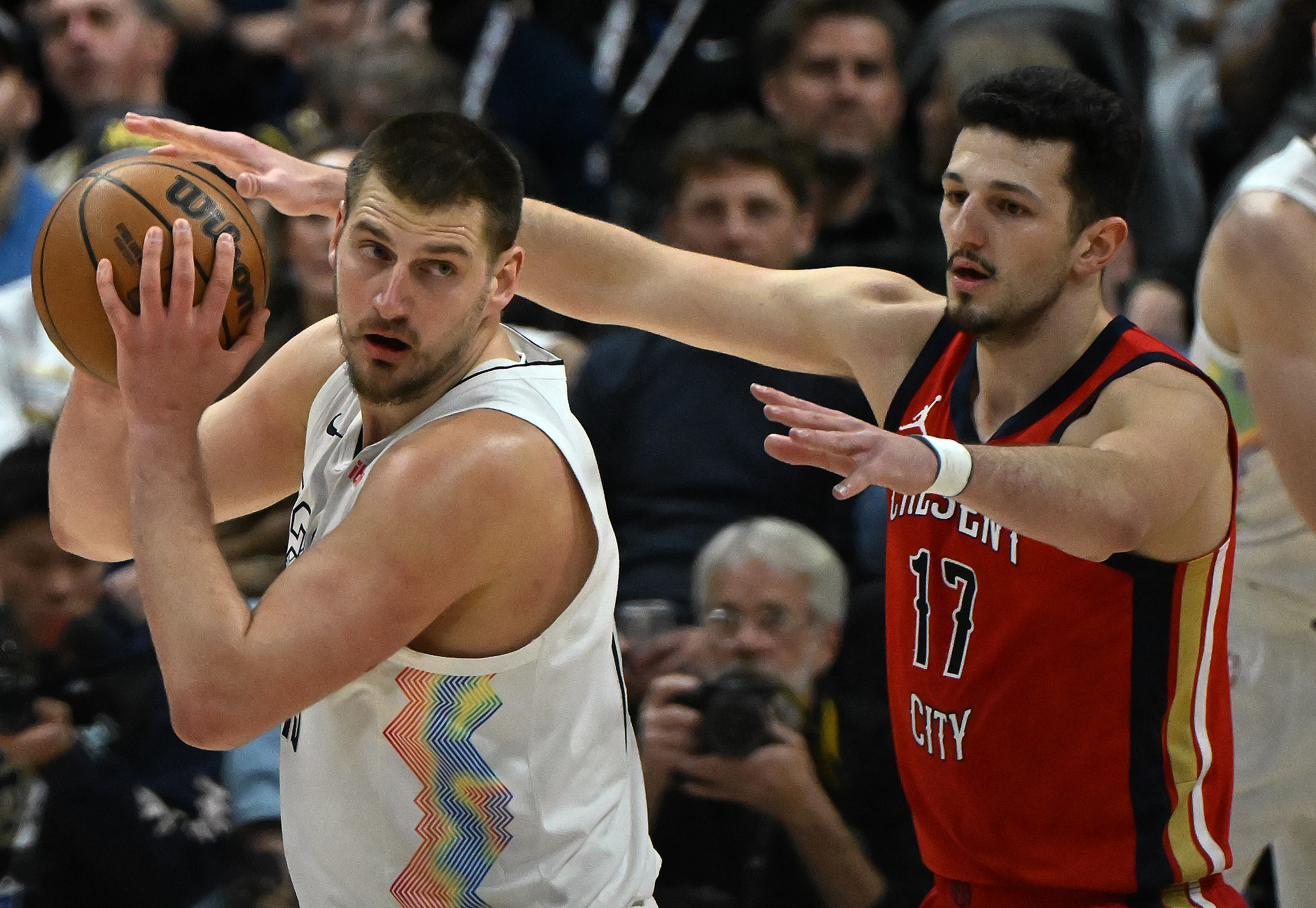 Nuggets Nikola Jokic is pressured by Pelicans Karlo Matkovici during the first quarter of a game at Ball Arena on Wednesday, Feb. 5, 2025. (Jerilee Bennett,The Gazette)