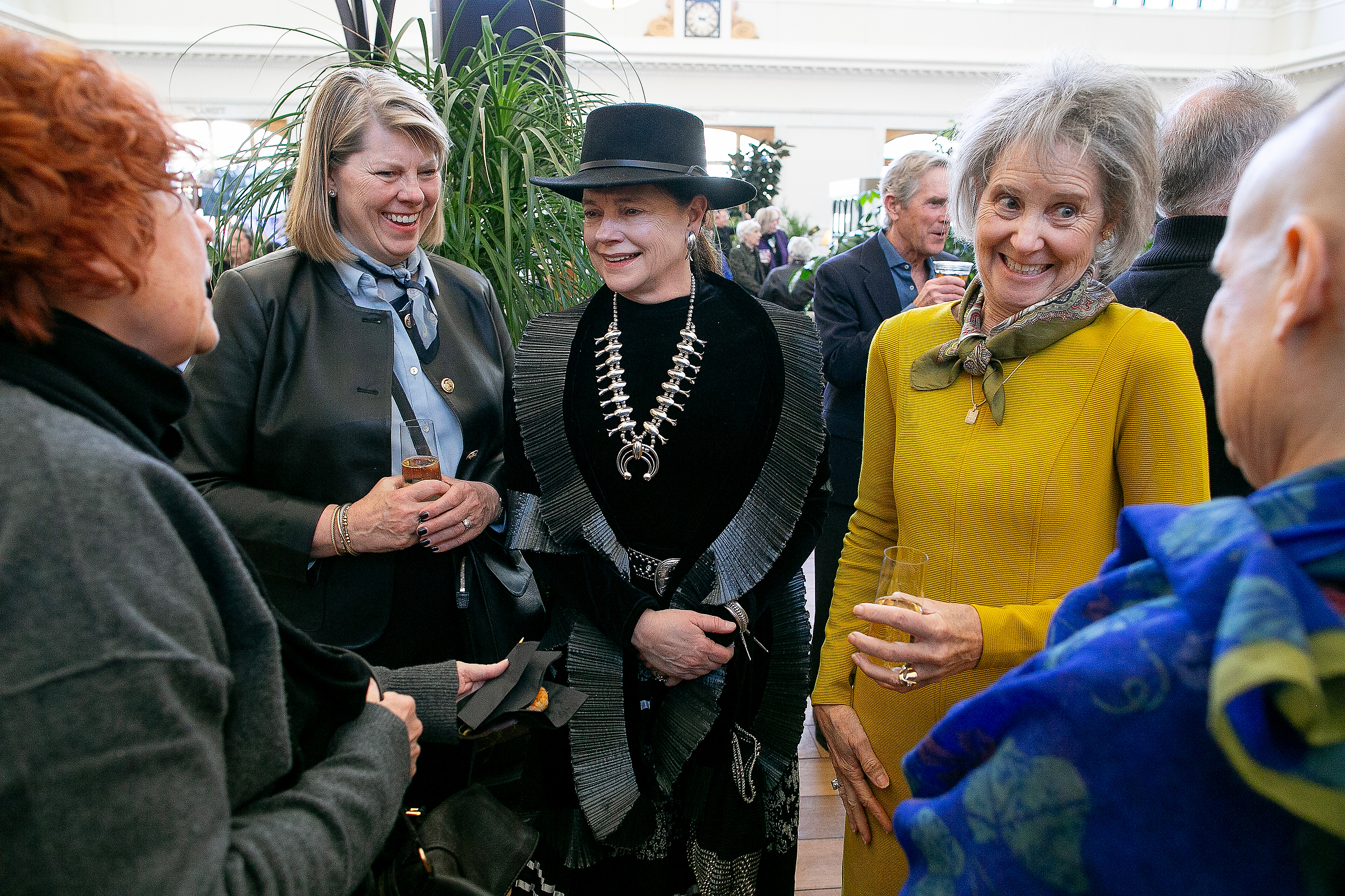 Madeline Collison, third from left, daughter in-law of Dana Crawford joins family and friends to celebrate Dana Crawford during her memorial at Union Station in Downtown Denver, Colo., Sunday . Feb. 23, 2025. Crawford is considered to be one of the most influential preservationist and developers in Downtown Denver city’s history. (Photo by Bear Gutierrez) (Bear Gutierrez)