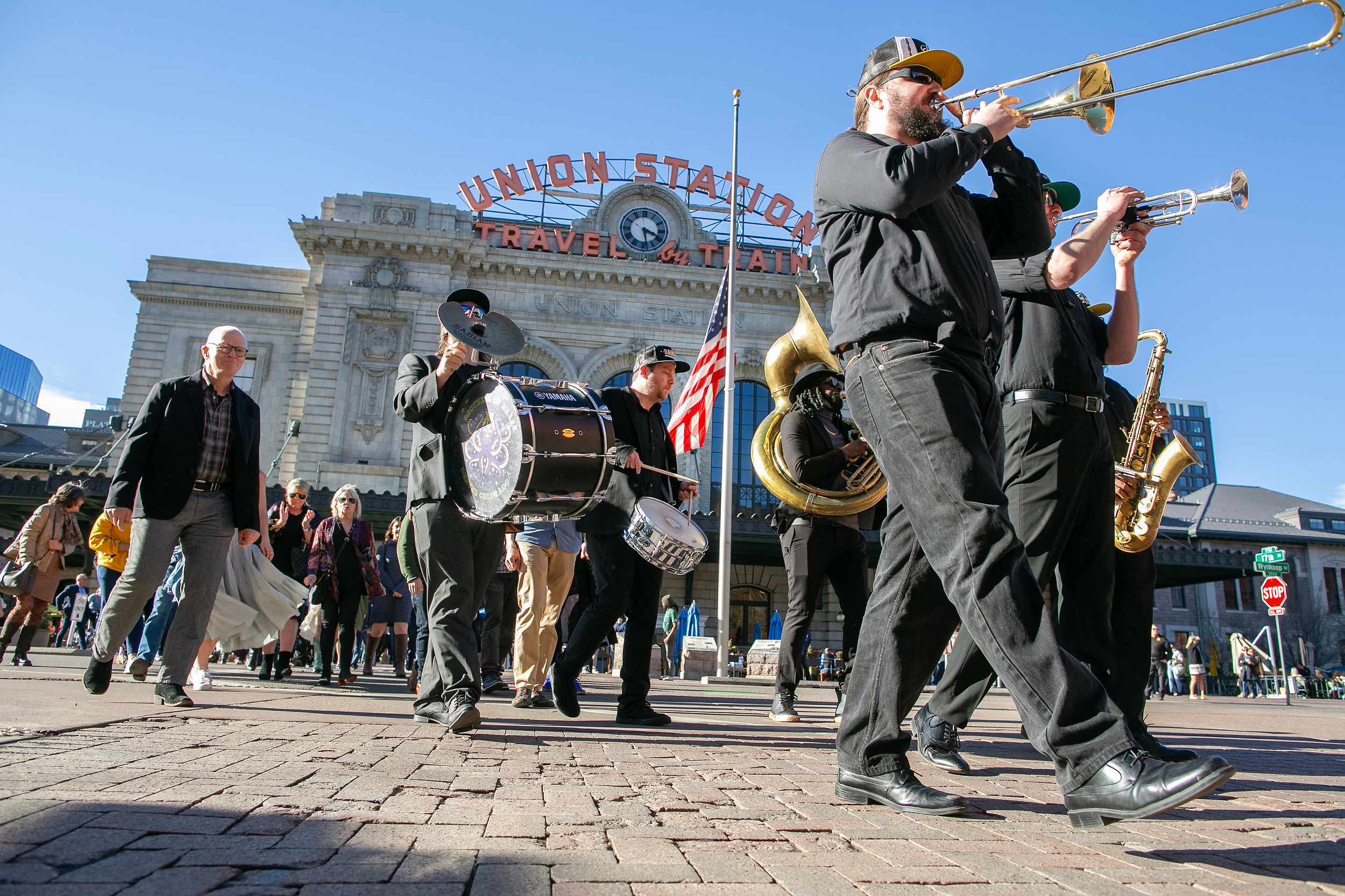 FILE PHOTO: A New Orleans-style jazz band leads a march down 17th street in front of Union Station during the memorial service for Dana Crawford at Union Station in Downtown Denver, Colo., Sunday, Feb. 23, 2025. Crawford is considered to be one of the most influential preservationist and developers in Downtown Denver city’s history. (Photo by Bear Gutierrez/Special to The Denver Gazette) (Bear Gutierrez/Special to The Denver Gazette)