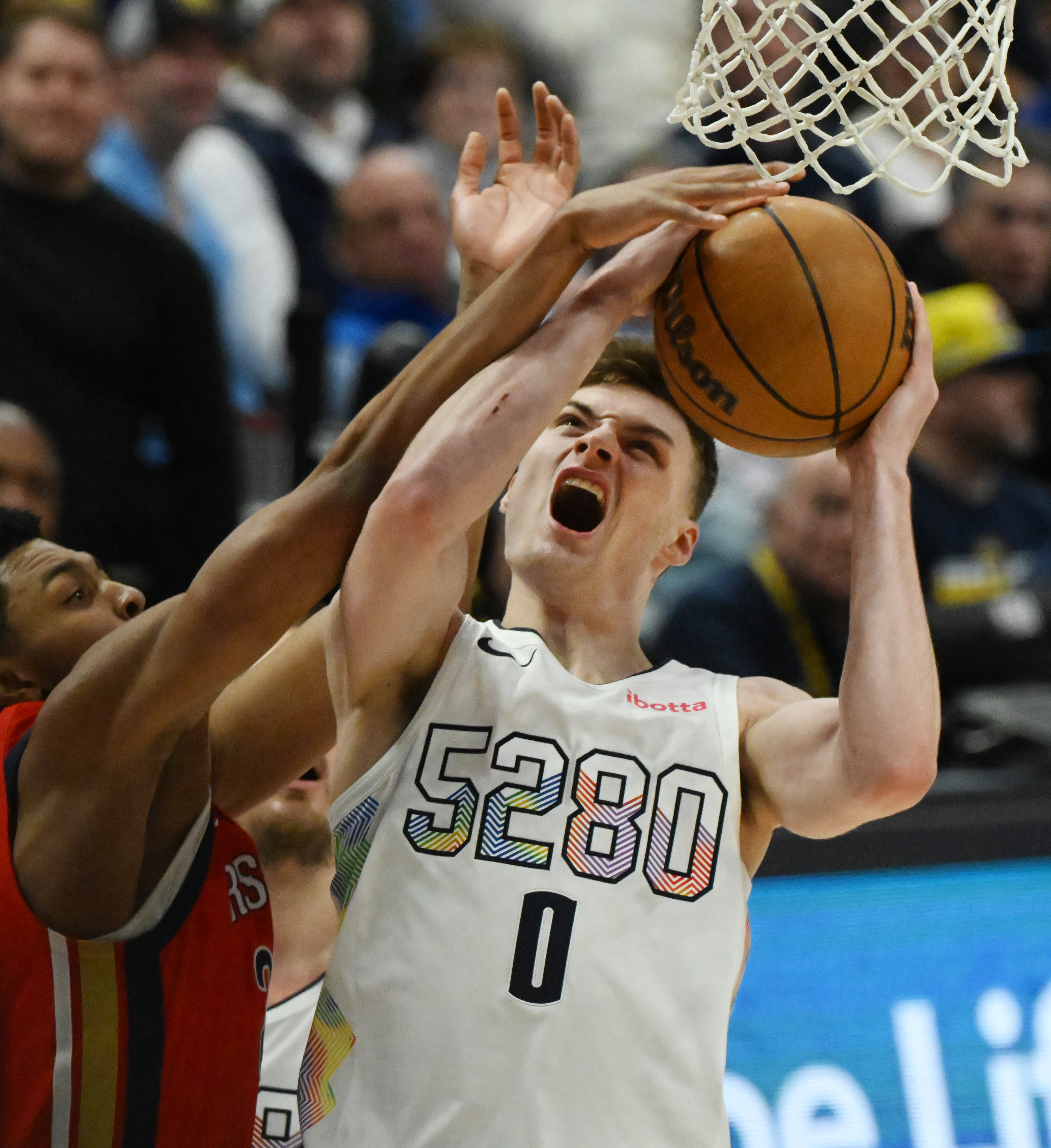 Nuggets Christian Braun shoots the ball during the 4th quarter of a game at Ball Arena on Wednesday, Feb. 5, 2025. The Nuggets defeated the Pelicans 144-119. (Jerilee Bennett,The Gazette)