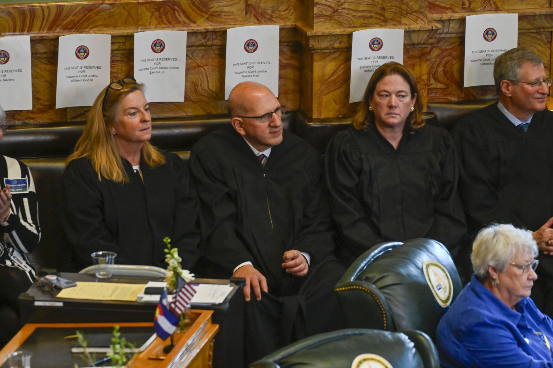 Justices Maria E. Berkenkotter, Carlos A. Samour Jr., Melissa Hart and Richard L. Gabriel attend Gov. Jared Polis' 2025 State of the State address on Thursday January 9, 2025 at the Colorado State Capitol. Special to Colorado Politics/John Leyba (John Leyba)