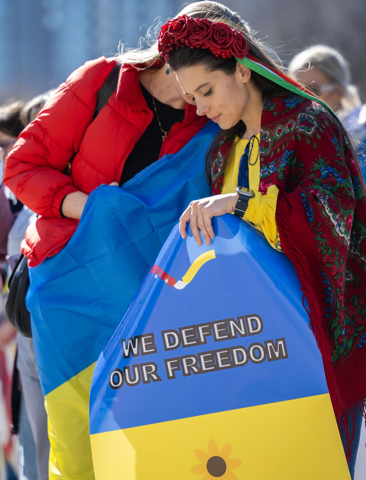 Tania Mostova holds a sign supporting Ukraine on the step of the Colorado State Capitol Sunday, Feb. 23, 2025, in Denver during a Stand for Ukraine Rally on the eve of the third anniversary of Russia's attack on Ukraine. About 1,000 people attended the rally organized by Ukrainians of Colorado. Mostova moved to the United States from Ukraine 10 years ago. (The Gazette, Christian Murdock) (Christian Murdock, The Gazette)