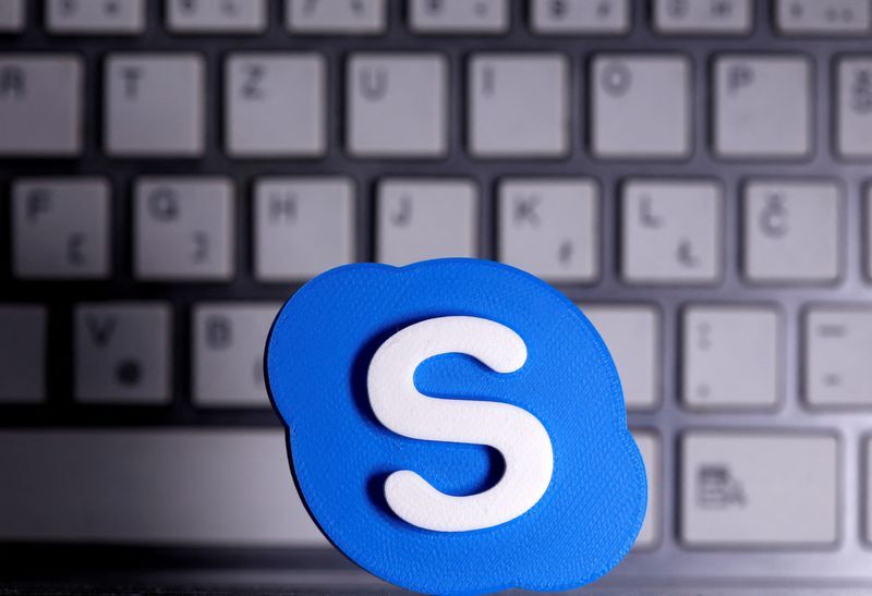 FILE PHOTO: A 3D printed Skype logo is placed in front of keyboard in this illustration