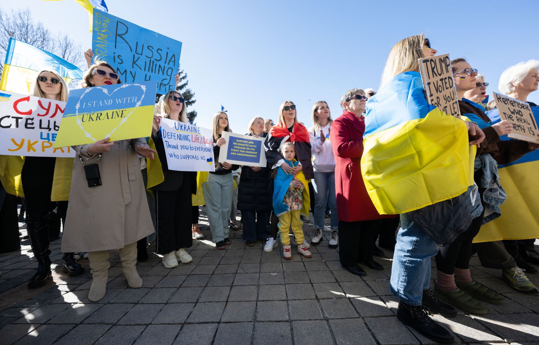 People listen to speakers at the steps of the Colorado State Capitol Sunday, Feb. 23, 2025, in Denver during a Stand for Ukraine Rally on the eve of the third anniversary of Russia's attack on Ukraine. About 1,000 people showed up at the rally organized by Ukrainians of Colorado. (The Gazette, Christian Murdock) (Christian Murdock, The Gazette)