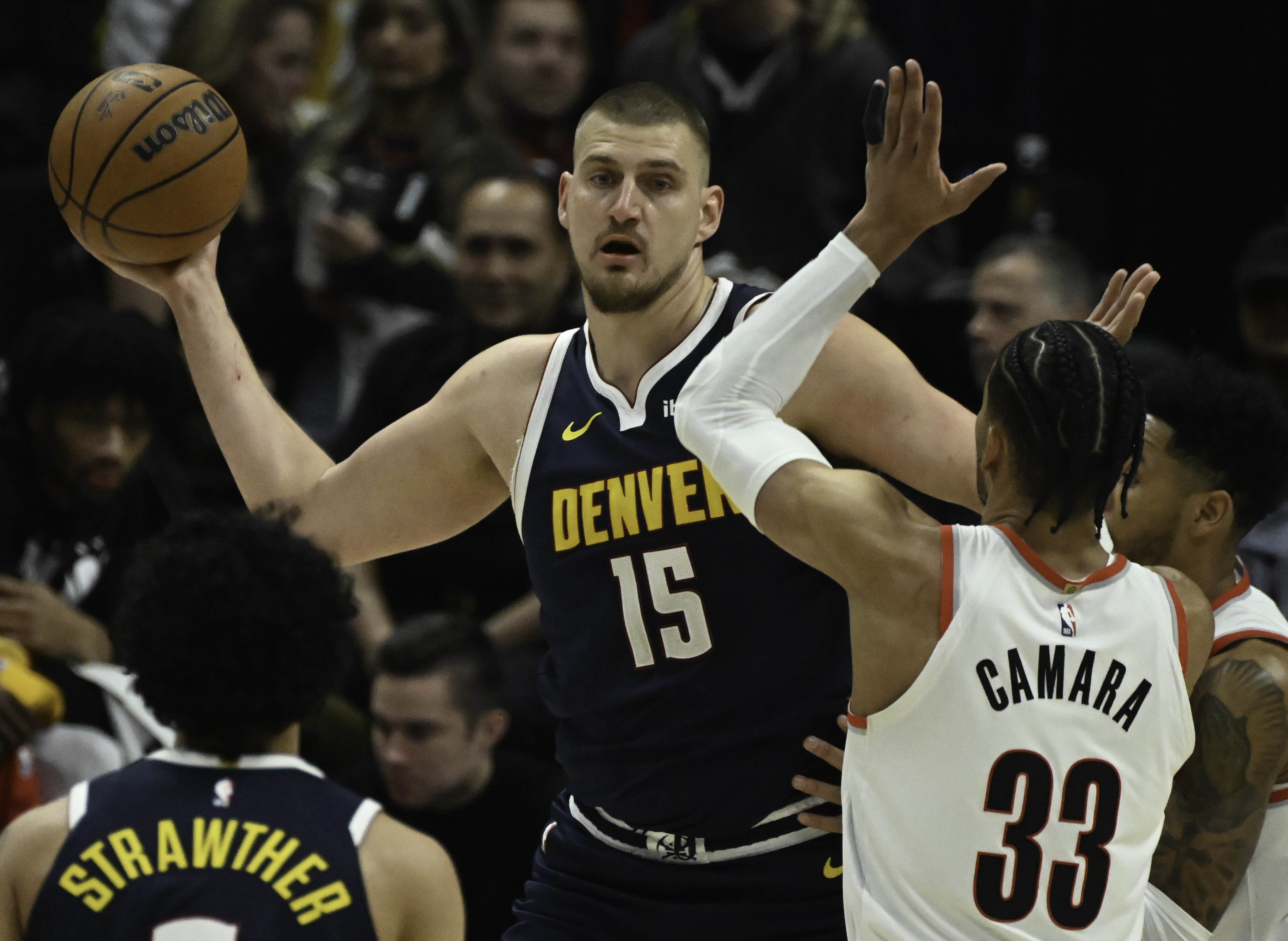 Denver Nuggets center Nikola Jokic (15) passes the ball during a game against the Trailblazers at Ball Arena on Wednesday, Feb. 12, 2025. (Jerilee Bennett,The Gazette)