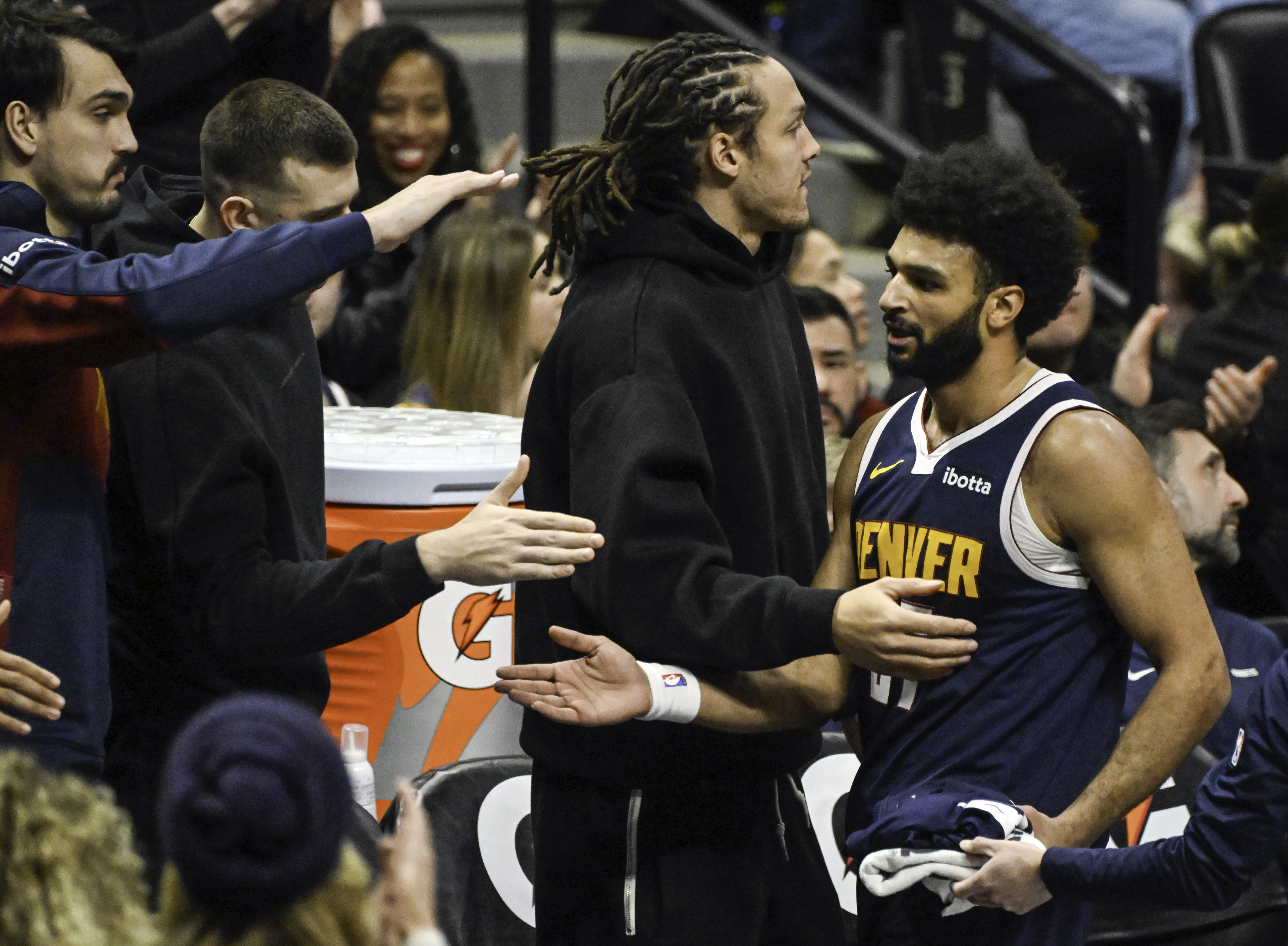 Nuggets fans give Denver Nuggets guard Jamal Murray (27) is congratulated at the end of the 3rd quarter when he ended the quarter with 49 points during a game at Ball Arena on Wednesday, Feb. 12, 2025. Murray scored a career high of 55 points in the game to lead the Nuggets to a 132-121 win over the Trailblazers. (Jerilee Bennett, The Gazette)