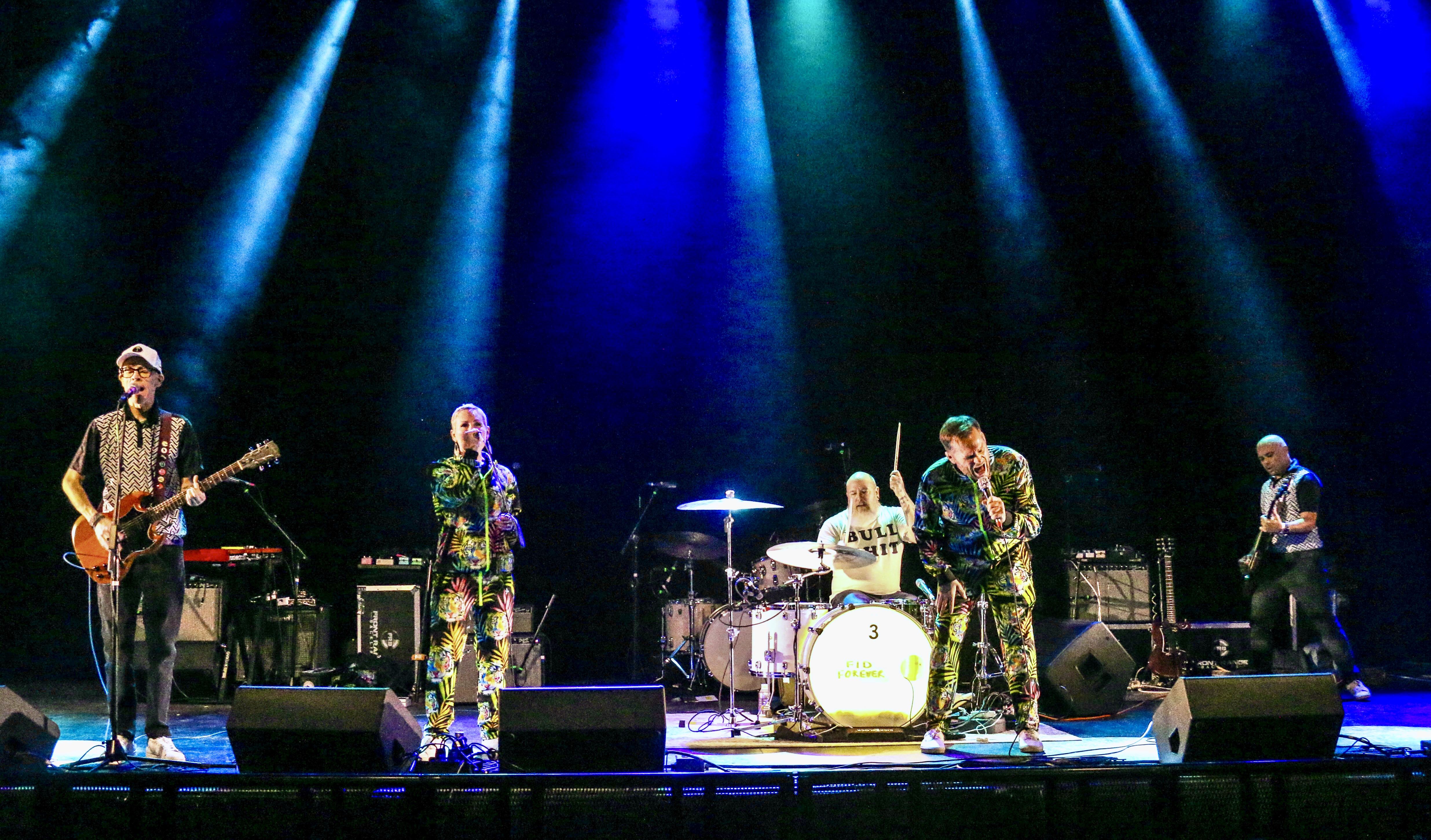 1. Sound check for the punk band Spells, which opened for Ted Leo and the Pharmacists on Jan. 25, 2025, at the Oriental Theater in northwest Denver. Twenty minutes after that set, Ben Roy, second from right, was doing a stand-up comedy routine 2 miles east at the Bug Theater, riffing in part on what had just happened at the Oriental. (JOHN MOORE/THE DENVER GAZETTE)