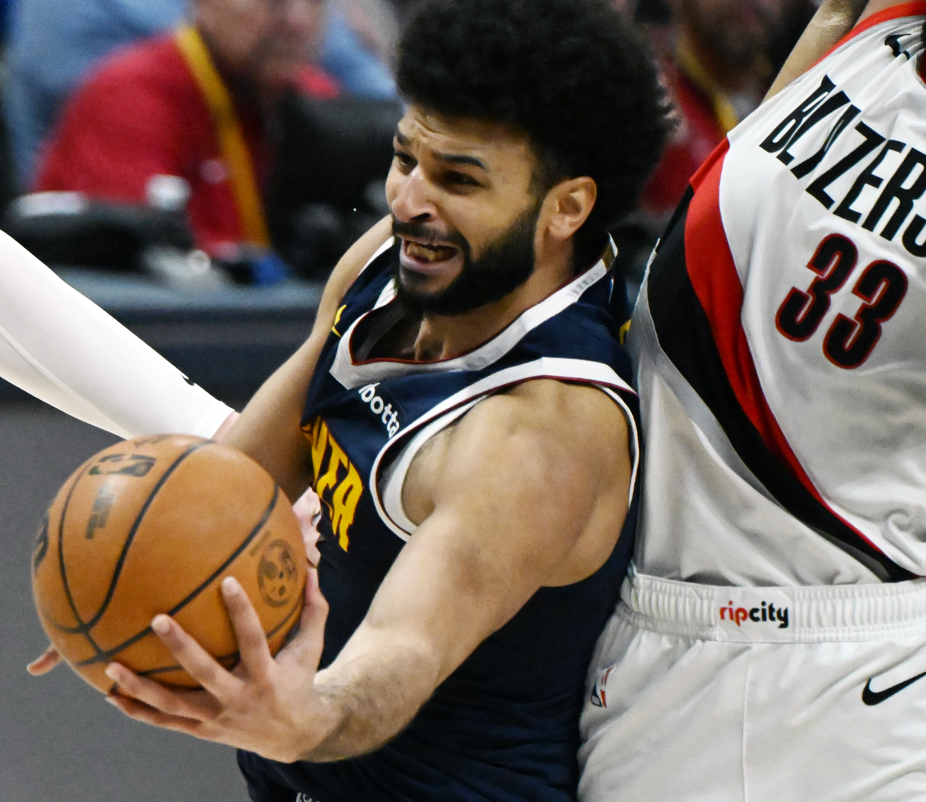 Denver Nuggets guard Jamal Murray (27) fights for the ball during a game against the Trailblazers at Ball Arena on Wednesday, Feb. 12, 2025. (Jerilee Bennett,The Gazette)