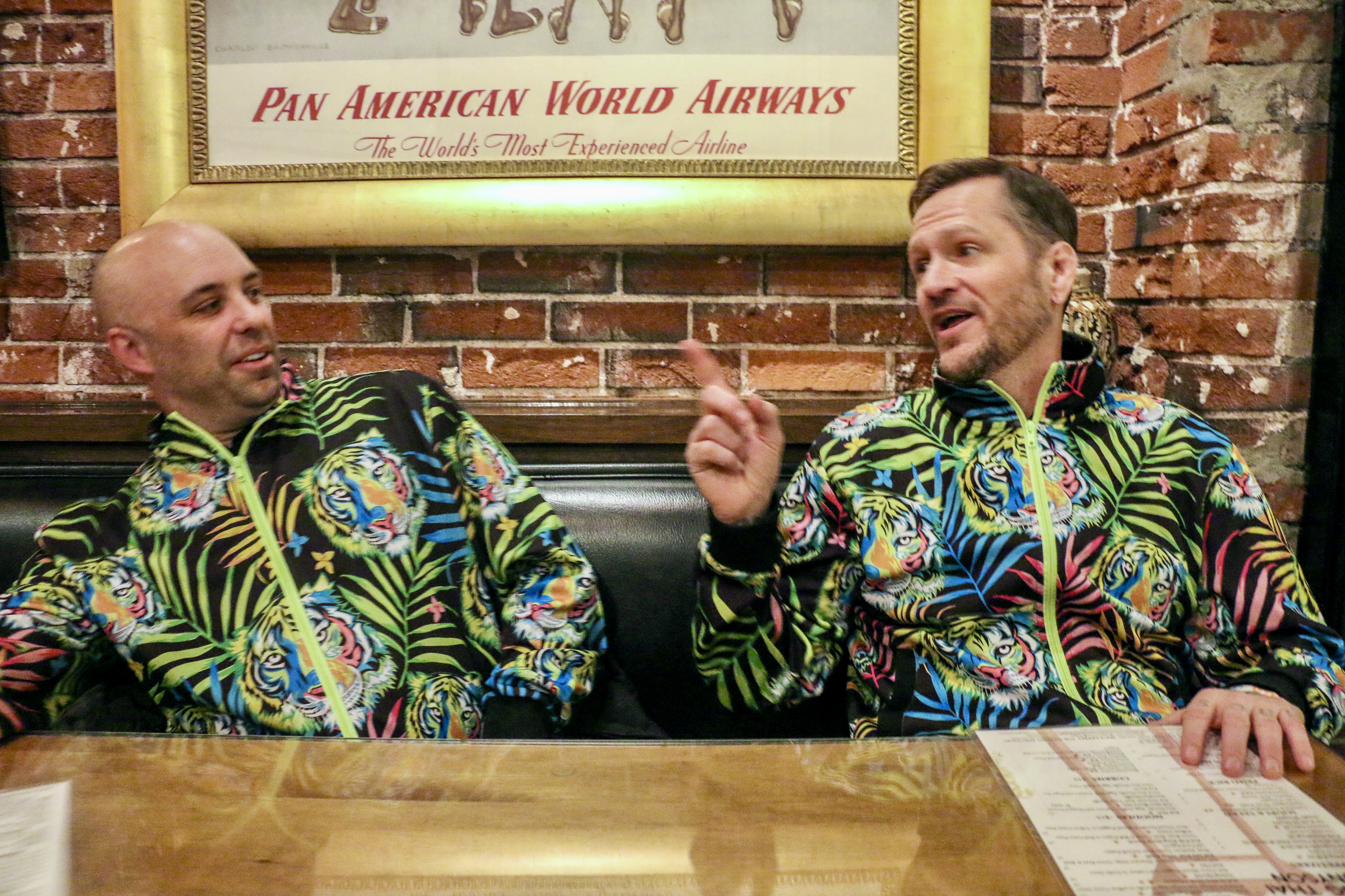 3. Don Bercell and Ben Roy of the punk band Spells has dinner at Swing Thai before opening for Ted Leo and the Pharmacists on Jan. 25, 2025, at the Oriental Theater in northwest Denver. Twenty minutes after that set, Roy was doing a stand-up comedy routine 2 miles east at the Bug Theater, riffing in part on what had just happened at the Oriental. (JOHN MOORE/THE DENVER GAZETTE)