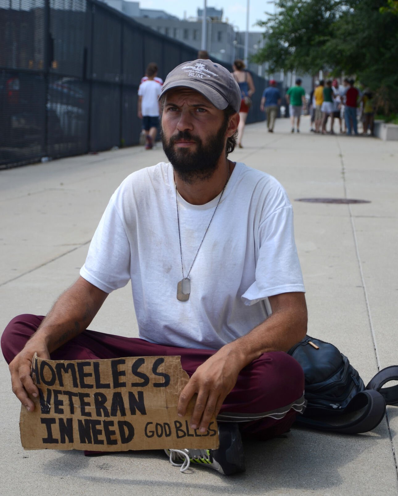 A homeless veteran pauses as he begs for money in Detroit, on July 6, 2014. Agencies within the VA healthcare system are looking for ways to end veteran homelessness. (Getty Images)