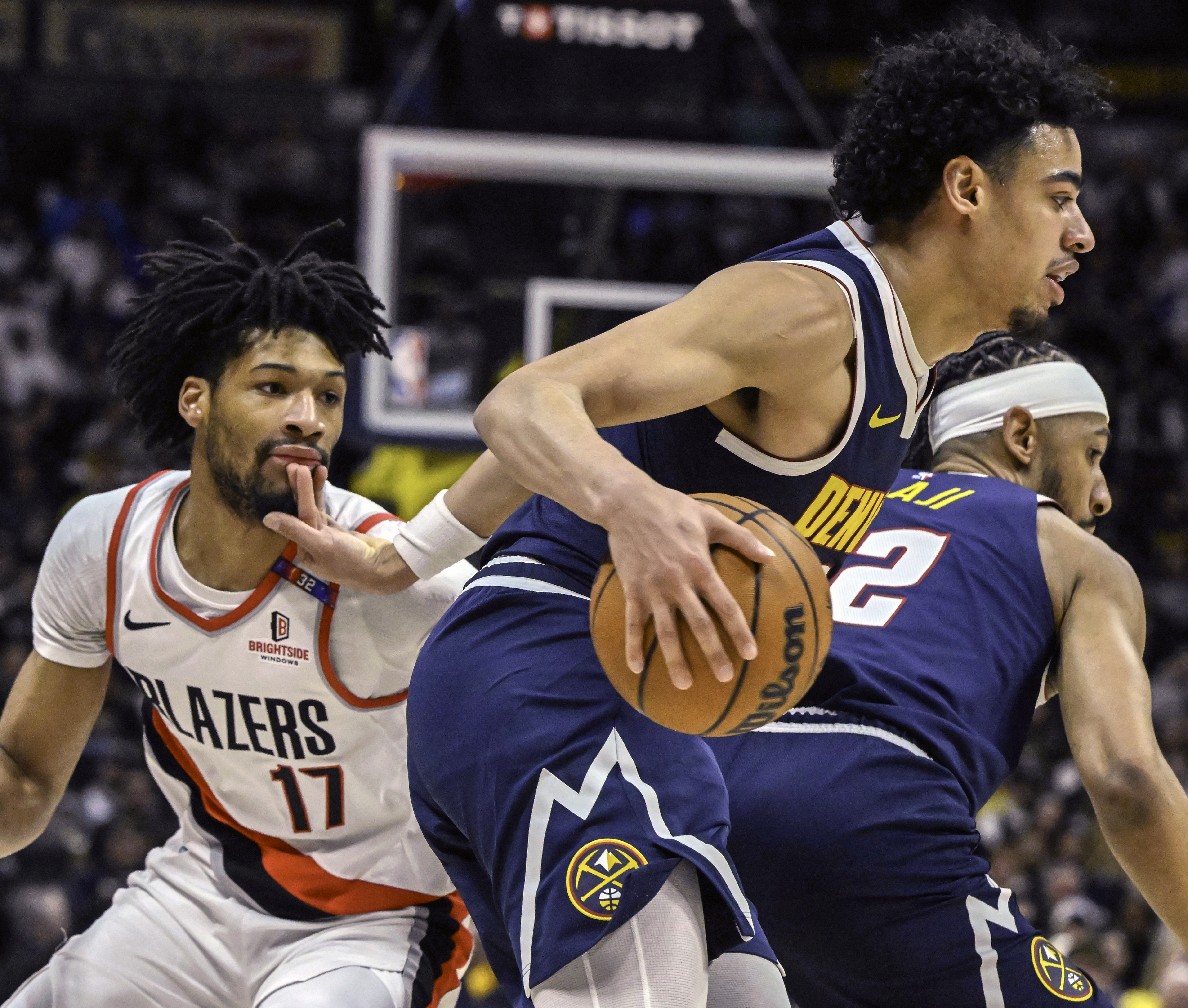 Denver Nuggets guard Julian Strawther (3) gets past Portland Trail Blazers guard Shaedon Sharpe (17) during the second quarter of a game at Ball Arena on Wednesday, Feb. 12, 2025. (Jerilee Bennett, The Gazette)