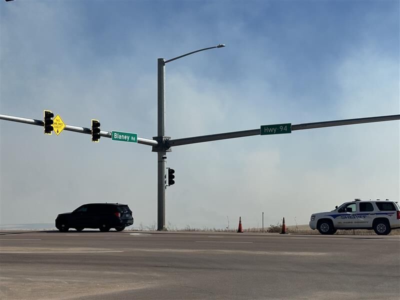 A grass fire between the Colorado Springs Airport and Schriever Space Force Base has prompted mandatory evacuation orders Thursday. (Glenn Wallace)