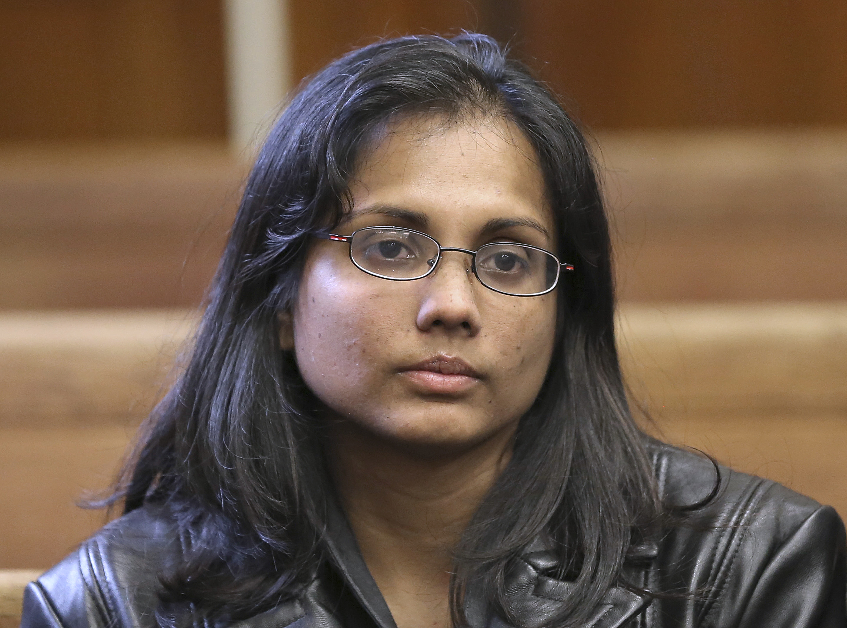 FILE - In this Nov. 22, 2013 file photo, former state chemist Annie Dookhan sits in Suffolk Superior Court in Boston. Dookhan pleaded guilty to tampering with evidence and falsifying thousands of tests in criminal drug cases, calling into question evidence used to prosecute the defendants. The state's highest court ordered the district attorneys in Massachusetts to produce lists by Tuesday, April 18, 2017, indicating how many of the approximately 24,000 tainted cases they would not or could not prosecute if new trials were ordered. (David L Ryan/The Boston Globe via AP, Pool, File) (LuigeDel PuertoManaging Editorluige.delpuerto@gazette.comhttps://secure.gravatar.com/avatar/766fd31de2cd272e966b7901a72100e4?d=mm&r=g)