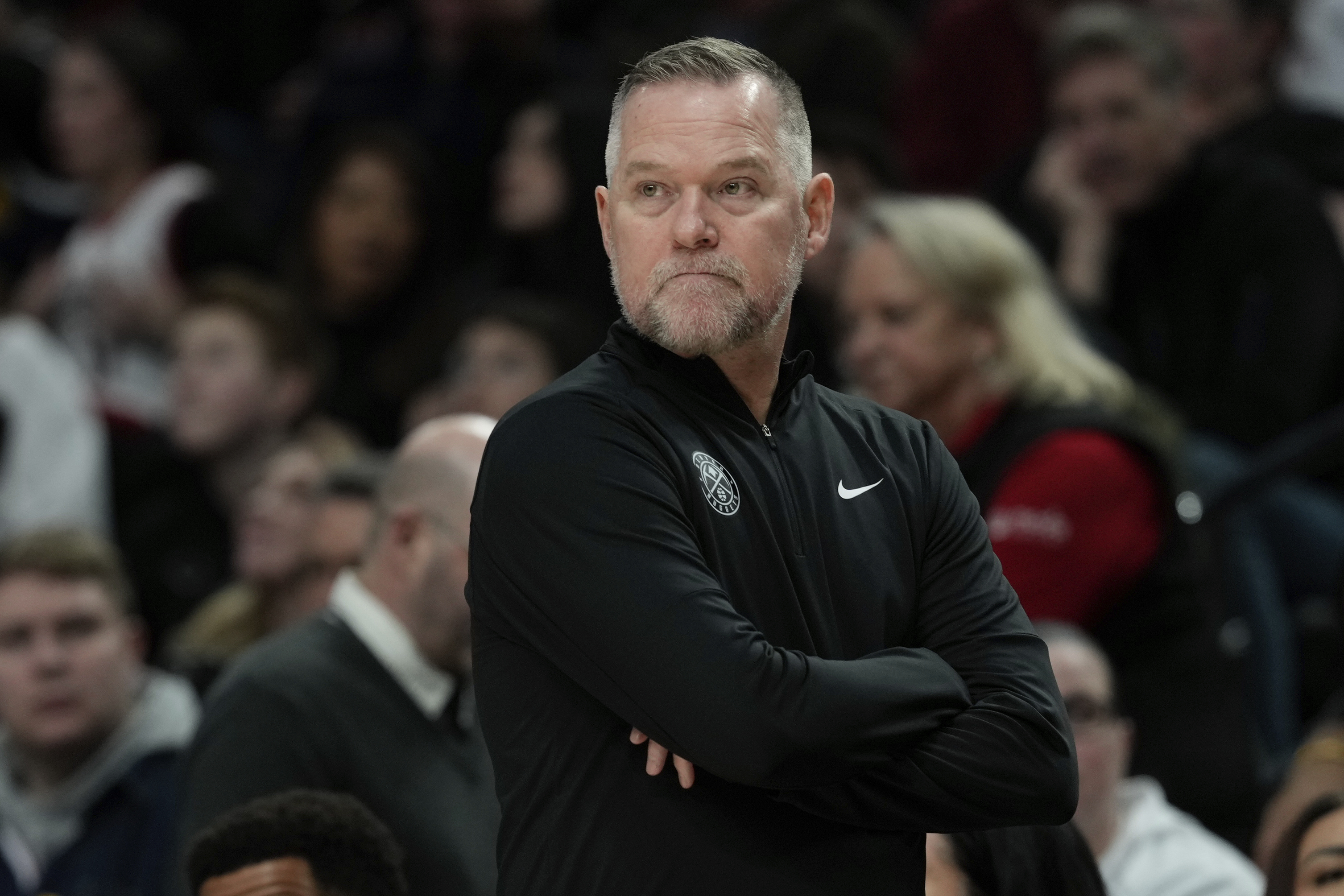Denver Nuggets head coach Michael Malone walks on the sideline during the second half of an NBA basketball game against the Portland Trail Blazers, Friday, March 21, 2025, in Portland, Ore. (AP Photo/Jenny Kane) (Jenny Kane)