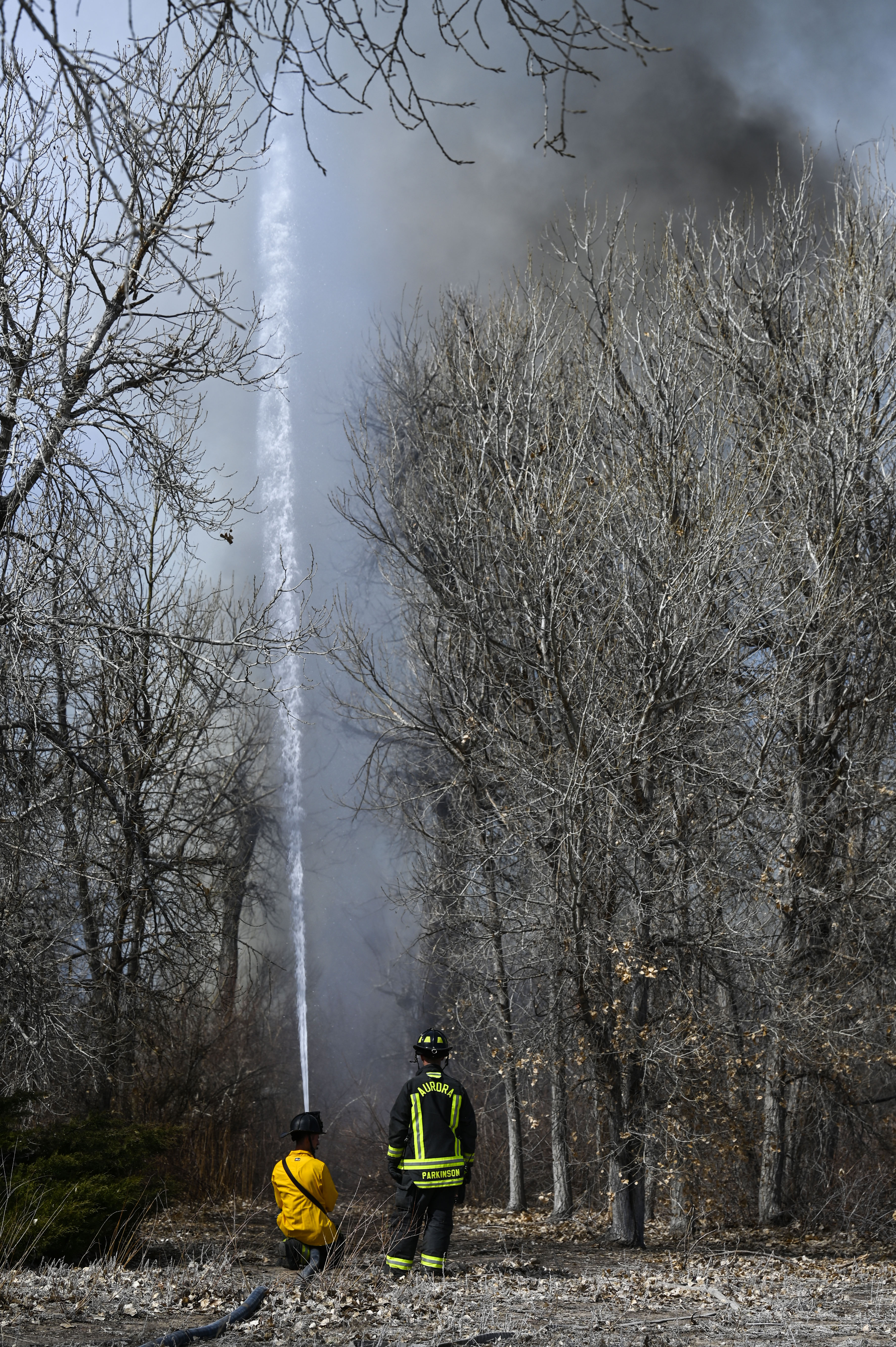 Aurora firefighters combat a wildfire at Jewell Wetlands Park in Aurora on Friday, March 21, 2025. (Stephen Swofford, Denver Gazette) (StephenSwoffordPhotographerstephen.swofford@gazette.comhttps://secure.gravatar.com/avatar/1ddcaf11c5d70eaa58546ddc4e038687?d=mm&r=g)