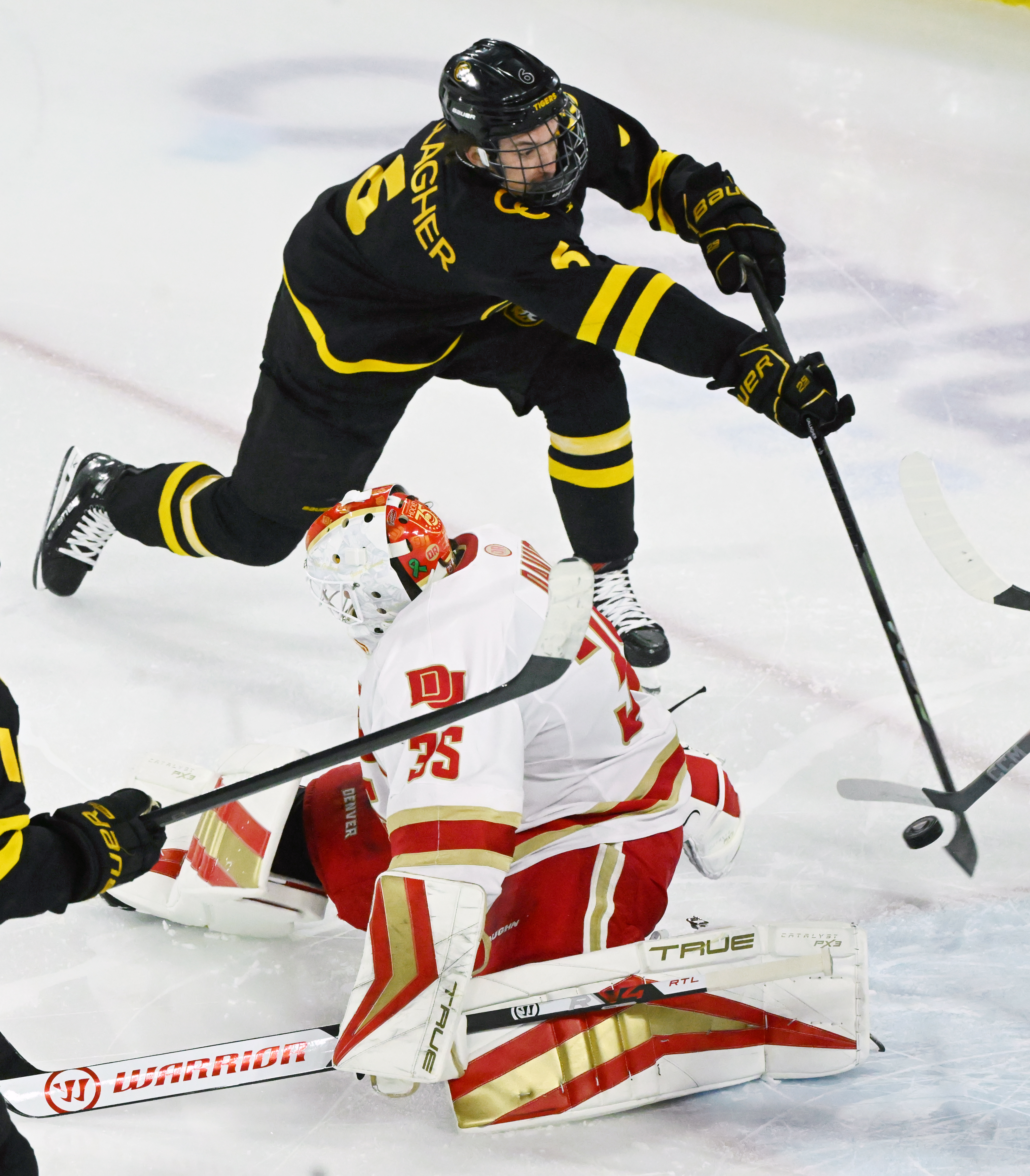 CC’s Ty Gallagher scored one of his two goals against DU’s goaltender Matt Davis during the third period of a game at Magness Arena in Denver on Sunday, March 16, 2025. DU ended CC’s season in game 3 of the first round of the playoffs by defeating them 9-2. (Jerilee Bennett, The Gazette)