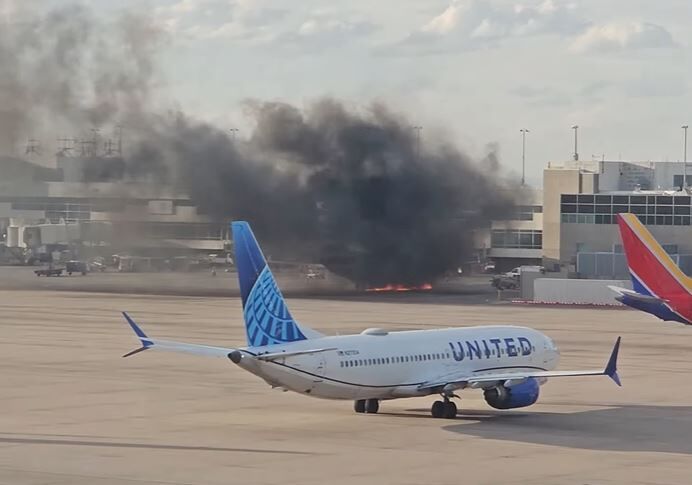 An American Airlines Flight caught fire at DIA on Thursday, March 13, 2025. (Source: Joshua Sunberg)