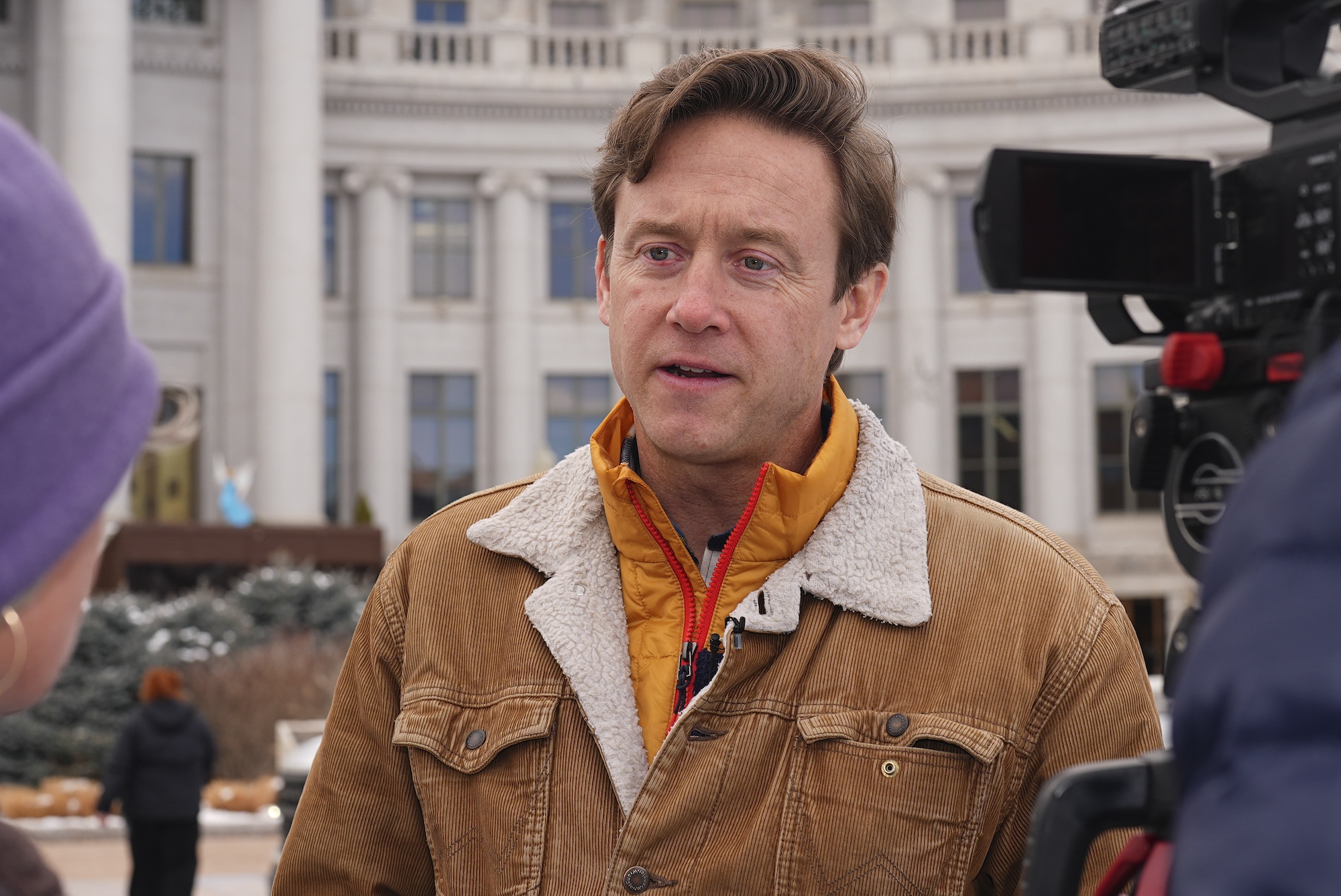 Denver Mayor Mike Johnston talks about immigration issues and how his city will handle them during an interview on Jan. 22, 2025, outside the City/County Building in Denver. ((AP Photo/David Zalubowski))