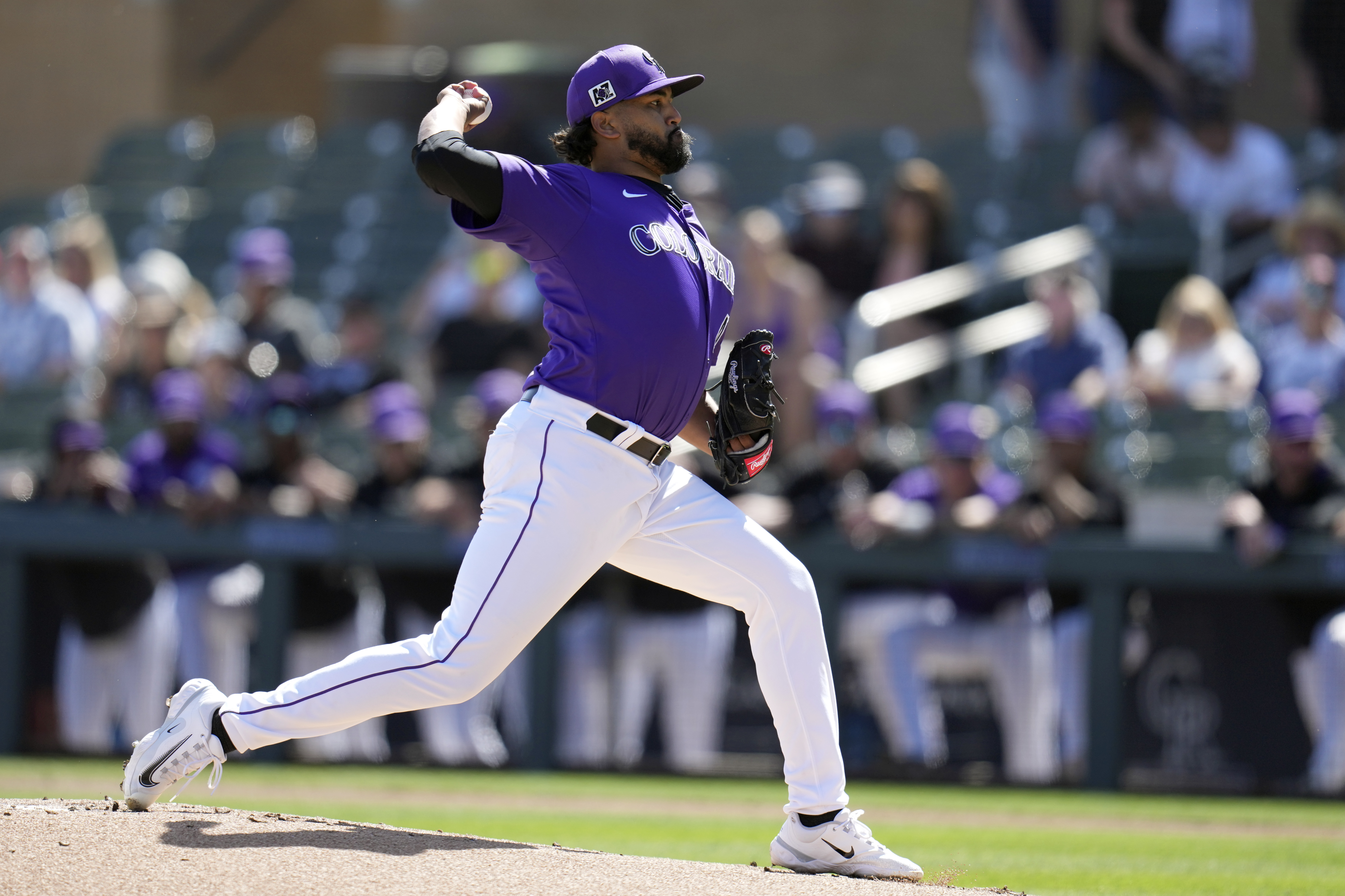 Colorado Rockies starting pitcher Germán Márquez throws against the Seattle Mariners during the first inning of a spring training baseball game Sunday, March 2, 2025, in Scottsdale, Ariz. (AP Photo/Ross D. Franklin) (Ross D. Franklin)