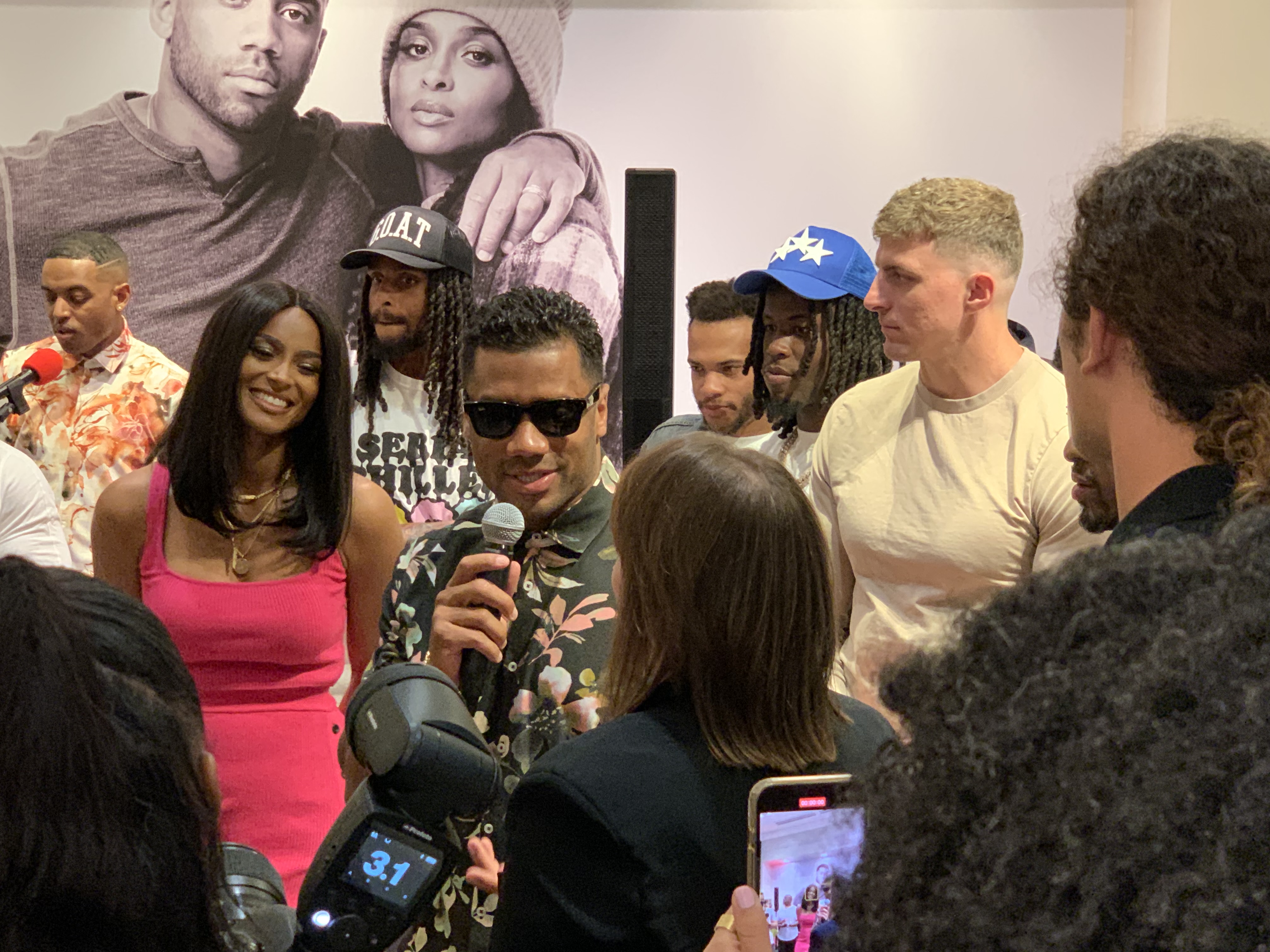 Ex-Broncos QB Russell Wilson, Ciara close store at Denver International Airport | Sports Business Insider