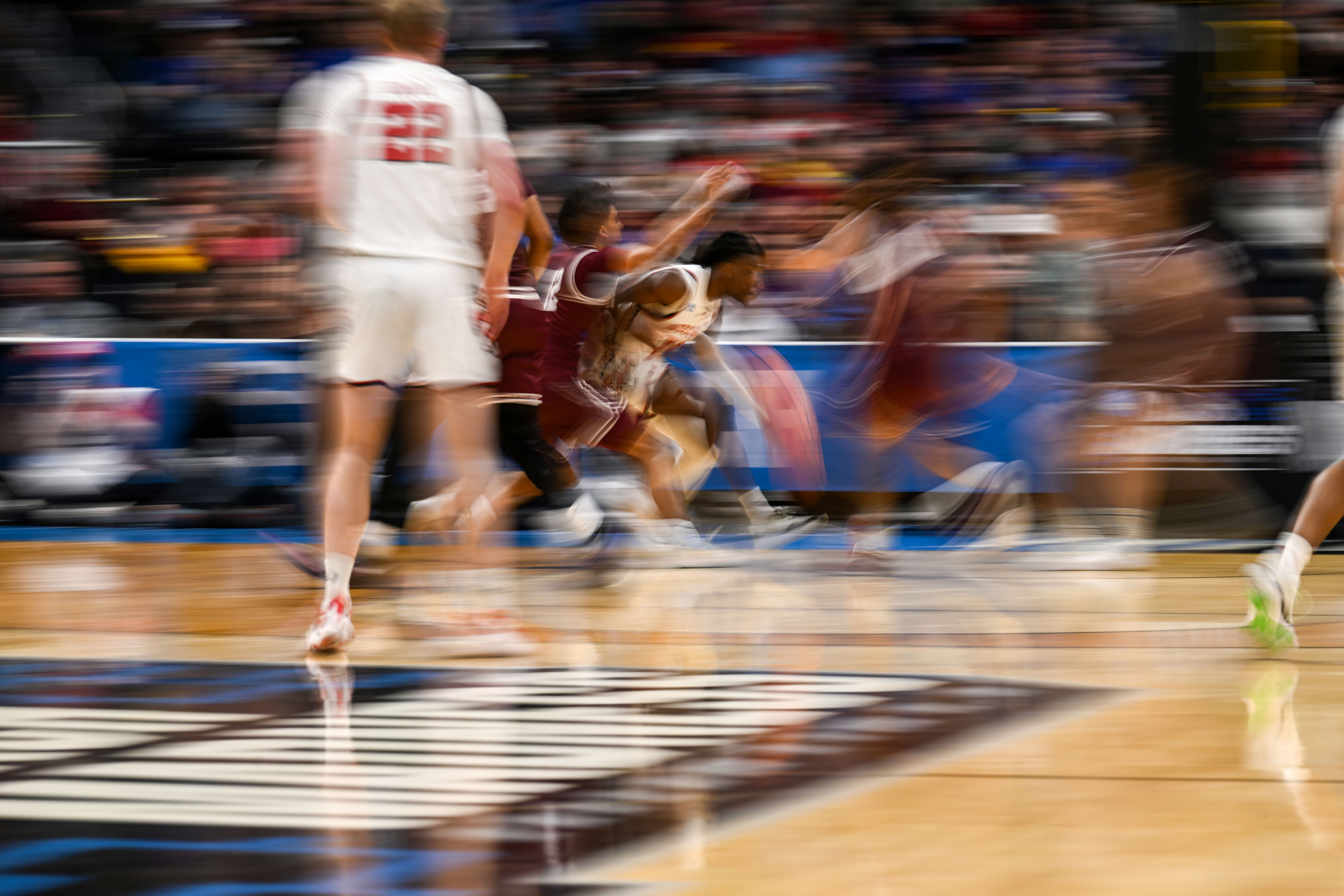 Wisconsin Badgers guard John Blackwell (25) drives to the basket past the Montana defense in the first half of the Montana vs Wisconsin game during NCAA March Madness on Thursday, March 20, 2025 (Stephen Swofford, Denver Gazette) (StephenSwoffordPhotographerstephen.swofford@gazette.comhttps://secure.gravatar.com/avatar/1ddcaf11c5d70eaa58546ddc4e038687?d=mm&r=g)