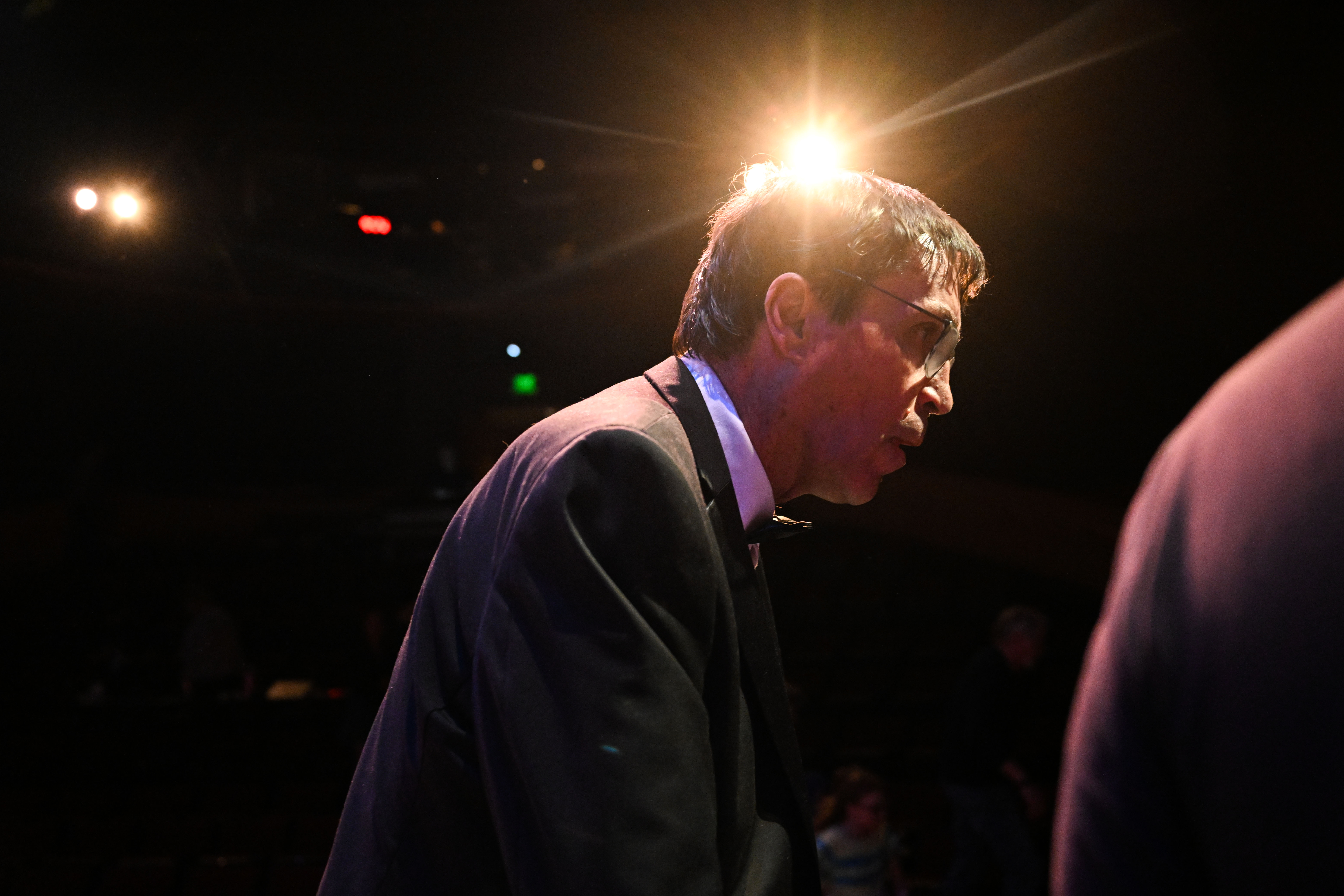 Ed Reinhardt walks off stage after curtain call during dress rehearsal for “Magic Moments” in Englewood on Wednesday, March 26, 2025. This year will be Ed’s 27th and final performance. (Stephen Swofford, Denver Gazette) (StephenSwoffordPhotographerstephen.swofford@gazette.comhttps://secure.gravatar.com/avatar/1ddcaf11c5d70eaa58546ddc4e038687?d=mm&r=g)