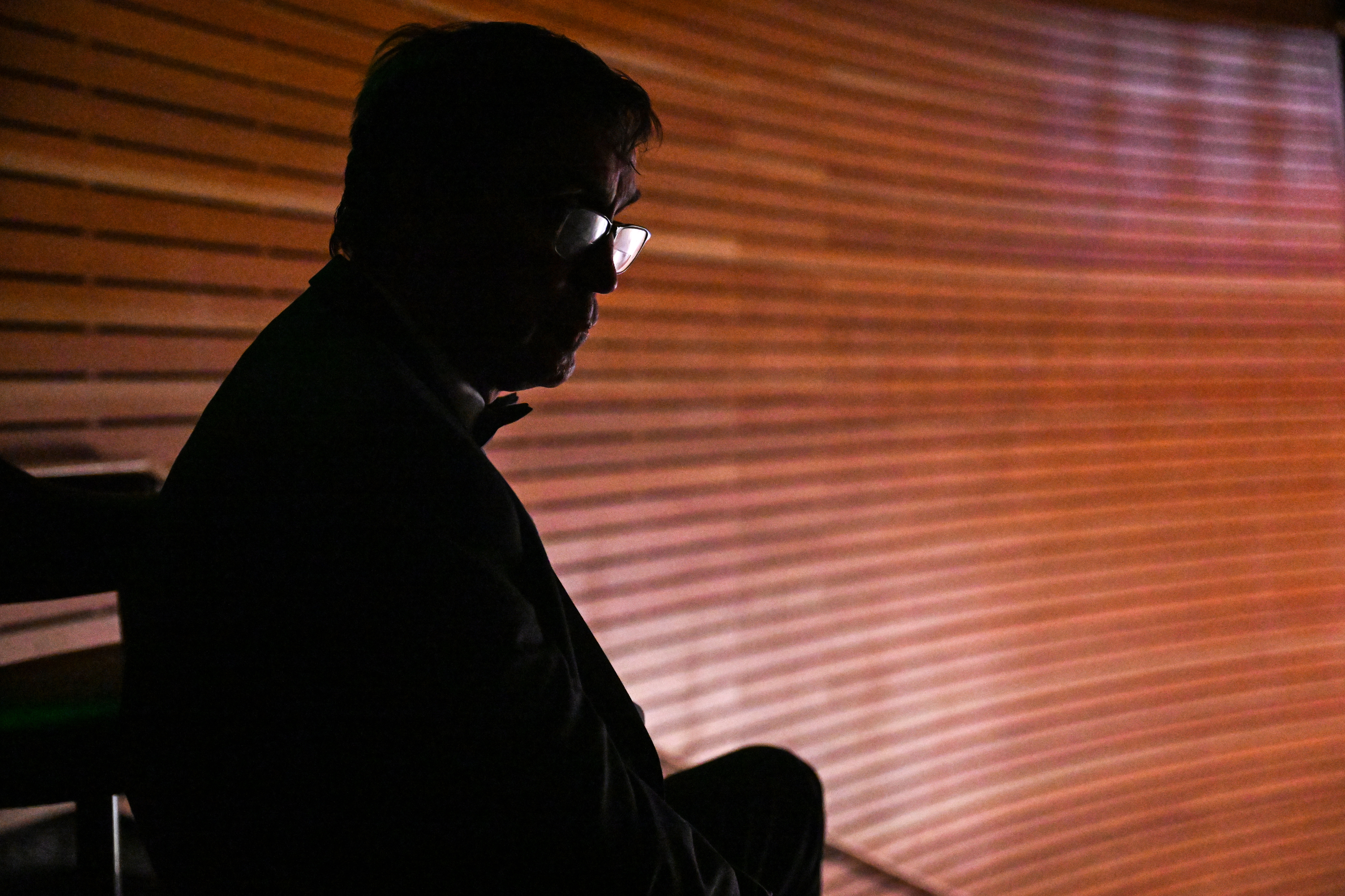 Ed Reinhardt watches the first act of “Magic Moments” as he waits for his cue during a dress rehearsal in Englewood on Wednesday, March 26, 2025. This year will be Ed’s 27th and final performance. (Stephen Swofford, Denver Gazette) (StephenSwoffordPhotographerstephen.swofford@gazette.comhttps://secure.gravatar.com/avatar/1ddcaf11c5d70eaa58546ddc4e038687?d=mm&r=g)