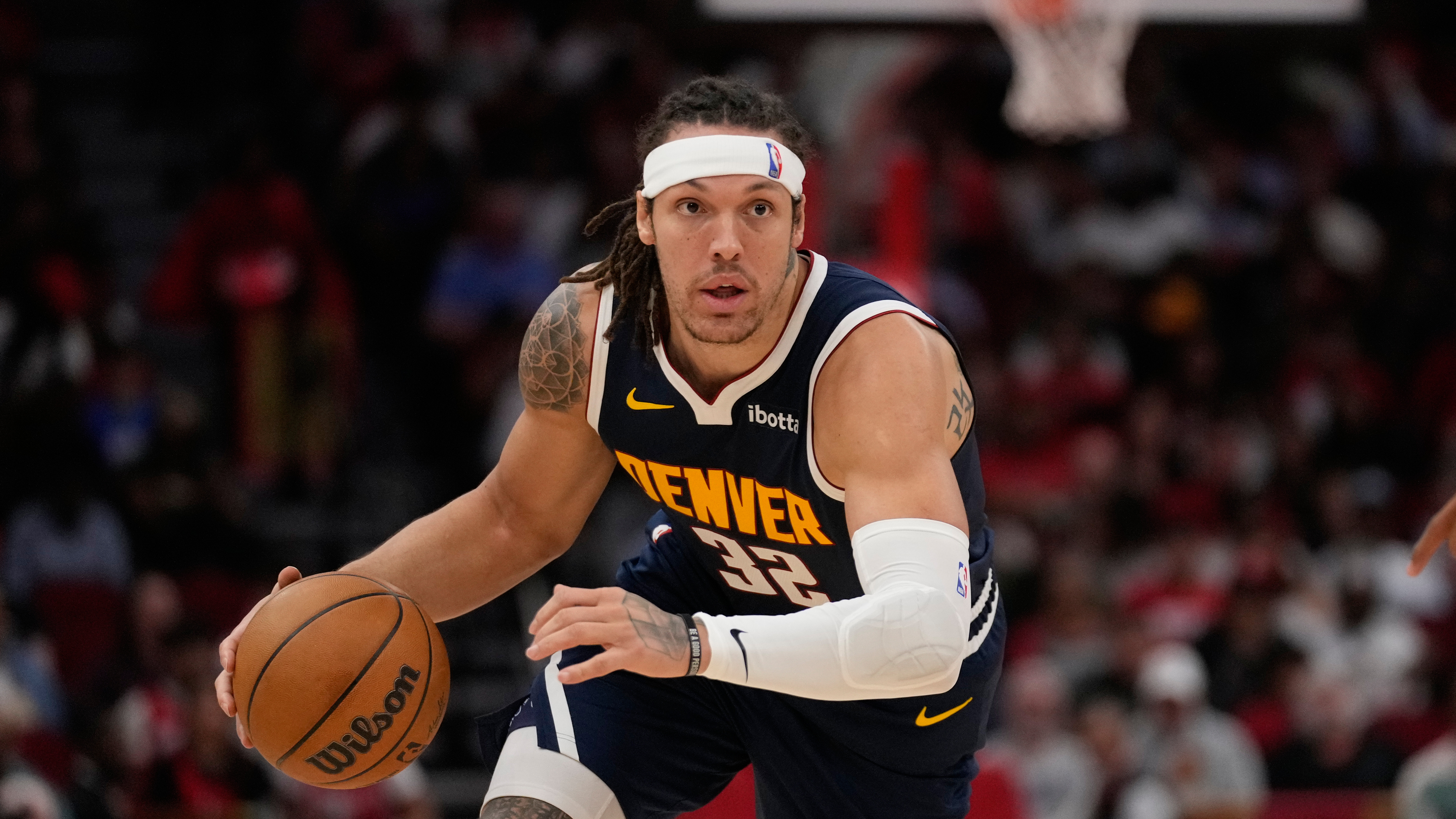 Denver Nuggets forward Aaron Gordon controls the ball during an NBA basketball game against the Houston Rockets in Houston, Sunday, March 23, 2025. (AP Photo/Ashley Landis) (Ashley Landis)