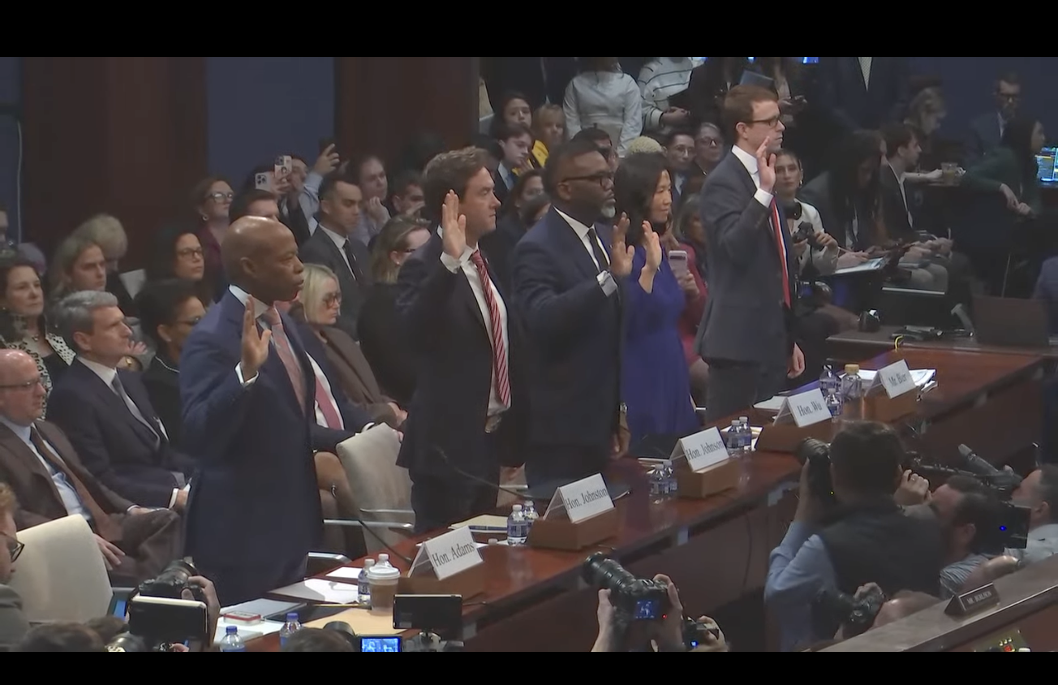Denver Mayor Mike Johnston, second from the left, is sworn in on Wednesday, March 5, prior to giving testimony before the U.S House Committee on Oversight and Government Reform. (House Committee on Oversight and Government Reform.)
