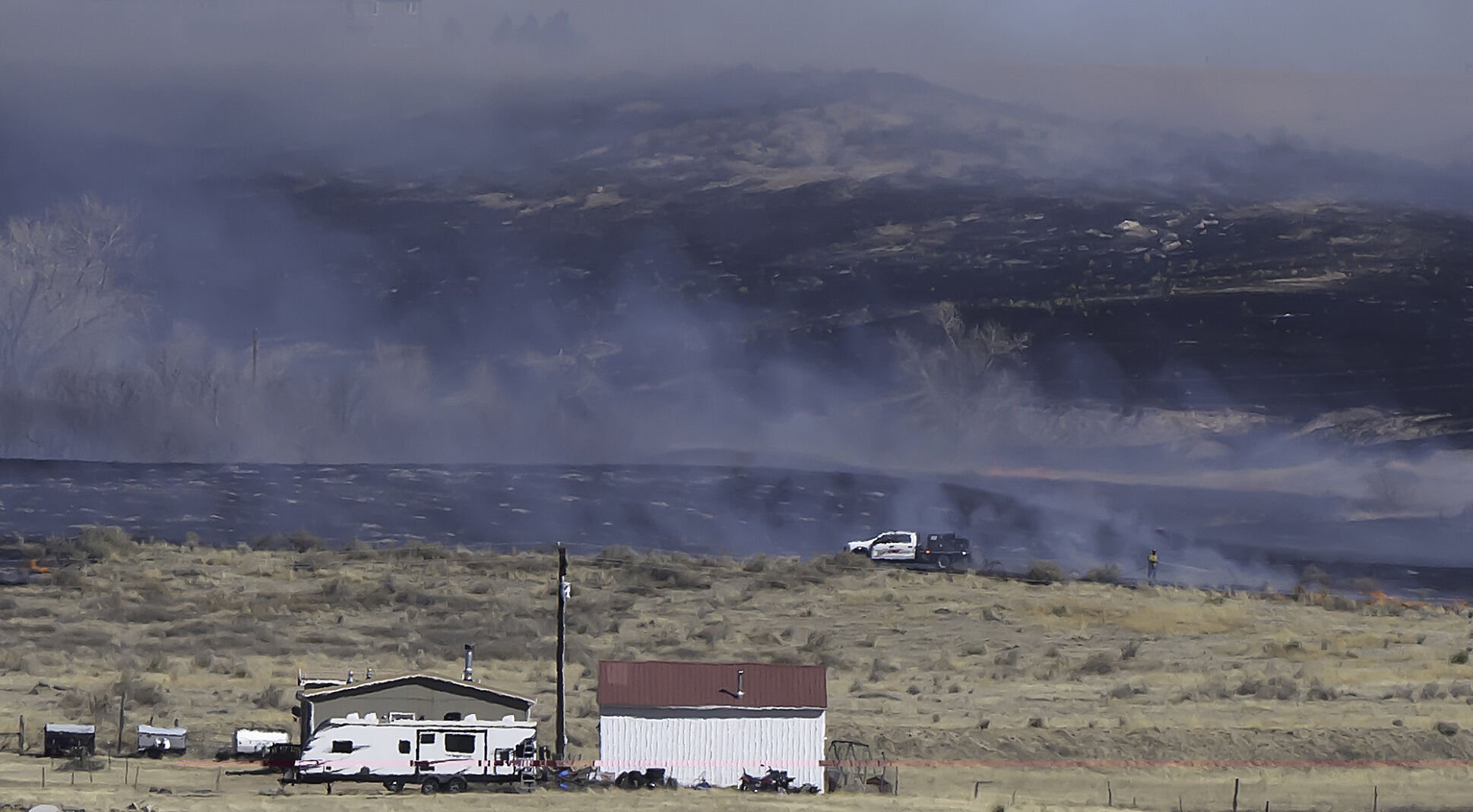 A brush fire east of Marksheffel Rd. came close to a home near Drennan Rd. and north of the Lorson Ranch subdivision on Thursday, March 13, 2025. (Jerilee Bennett, The Gazette)