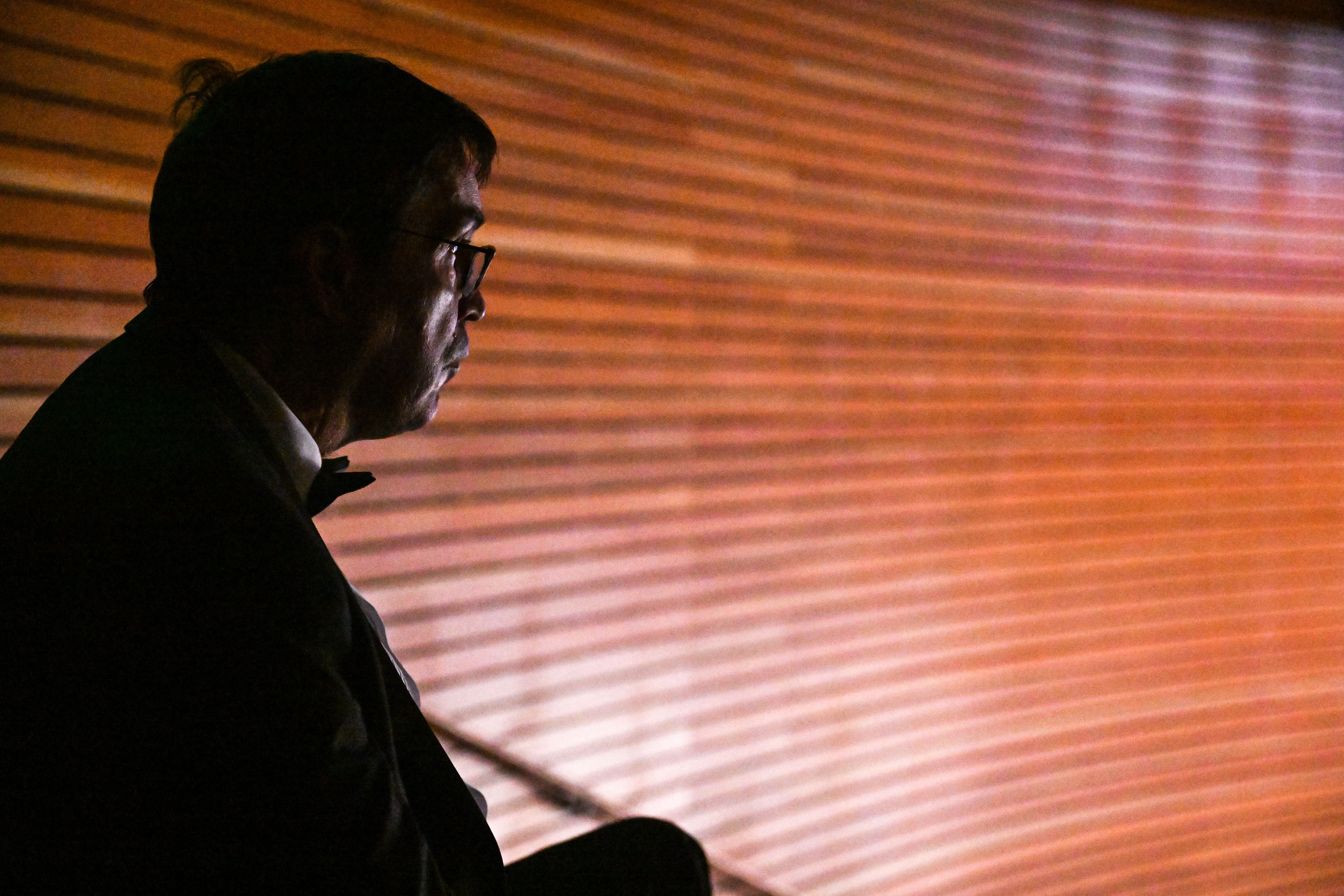 Ed Reinhardt watches the first act of “Magic Moments” as he waits for his cue during a dress rehearsal in Englewood on Wednesday, March 26, 2025. This year will be Ed’s 27th and final performance. (Stephen Swofford, Denver Gazette) (StephenSwoffordPhotographerstephen.swofford@gazette.comhttps://secure.gravatar.com/avatar/1ddcaf11c5d70eaa58546ddc4e038687?d=mm&r=g)