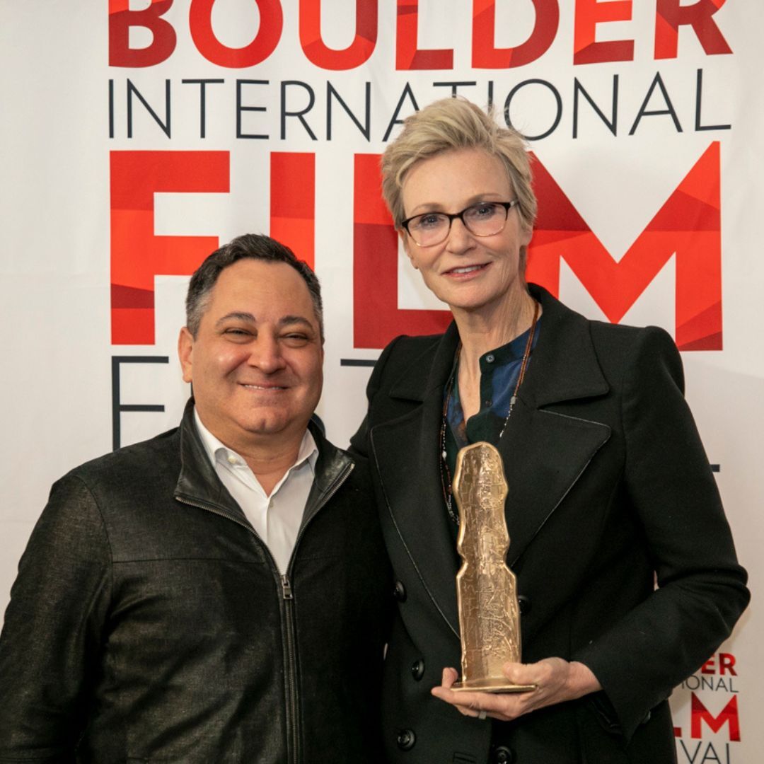 FILE PHOTO: Hollywood Reporter editor Scott Feinberg presented Jane Lynch with the Boulder International Film Festival's Entertainer of the Year Award at the Boulder Theater on March 15. (BOULDER INTERNATIONAL FILM FESTIVAL)