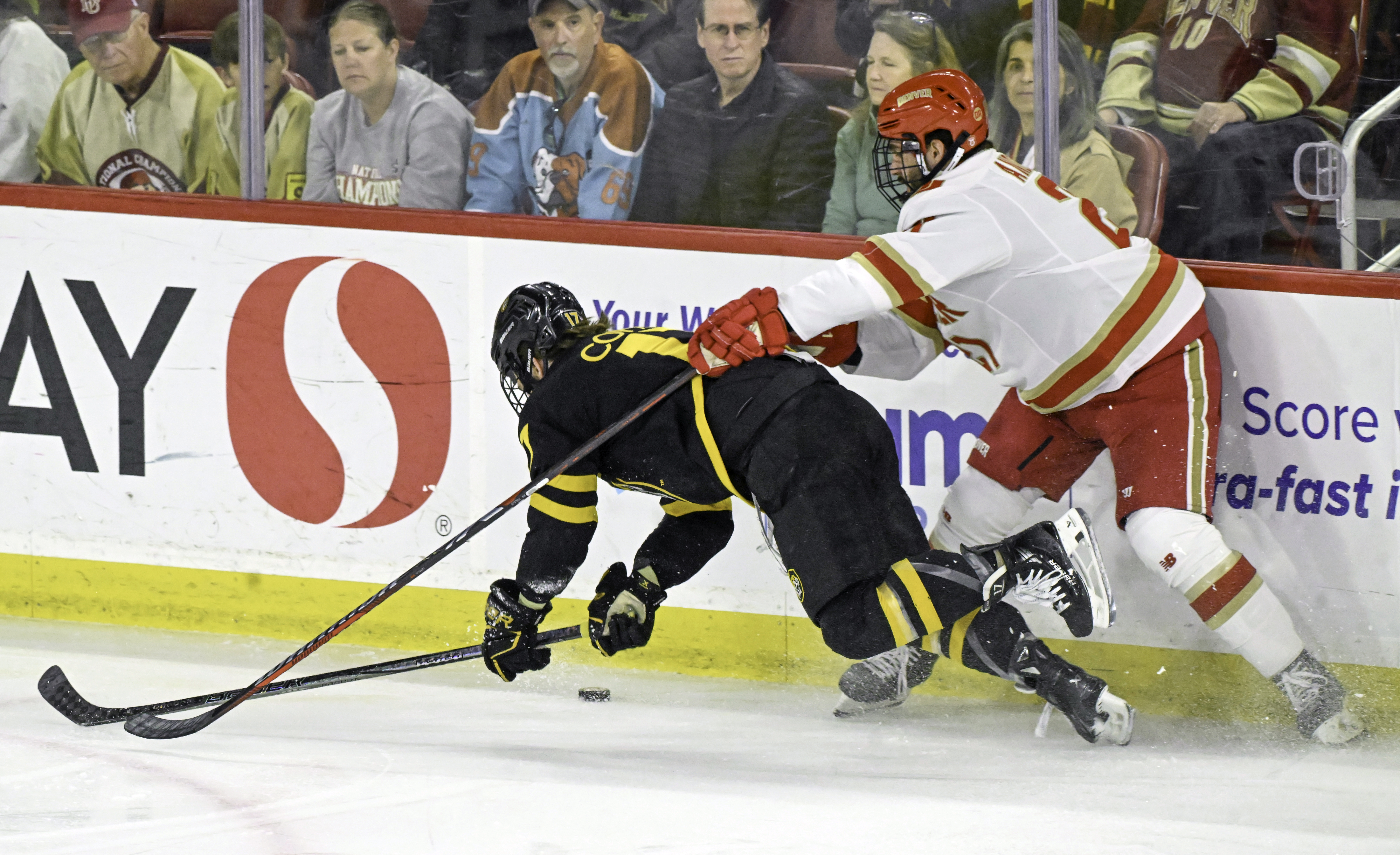 DU’s Kent Anderson defends CC’s Tyler Coffey during a game at Magness Arena on Sunday, March 16, 2025. DU won the game 9-2. (Jerilee Bennett)
